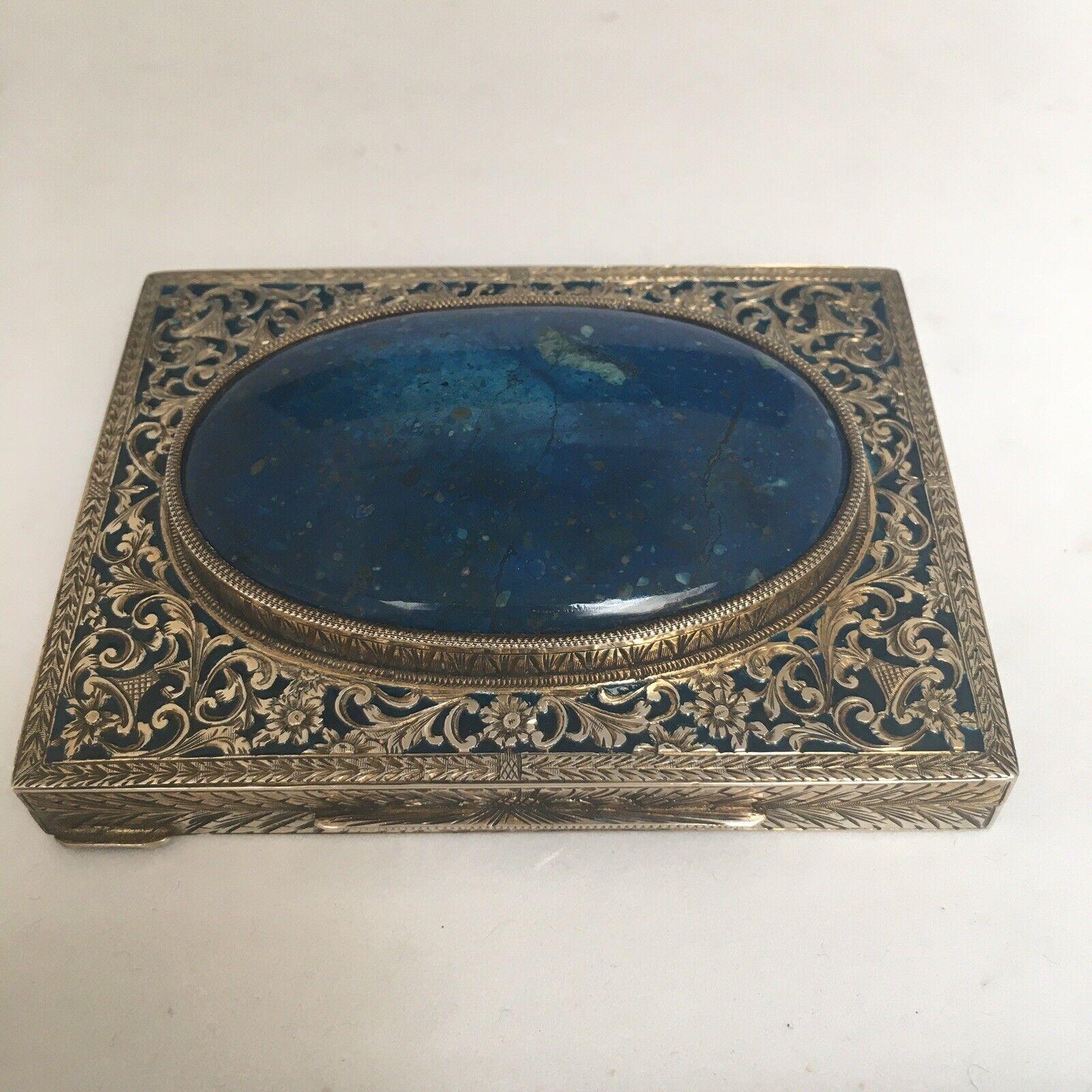 Italian Silver 3.75” by 2.75” by  3/16 “  Deep Sodalite 800 Silver Plique a Jour Enamel Box

152.9 Gram  
Sodalite
In good condition, no damage, no evidence of repairs 
Marked 800 and Italian hallmarks 
In good condition, no damage, no evidence of