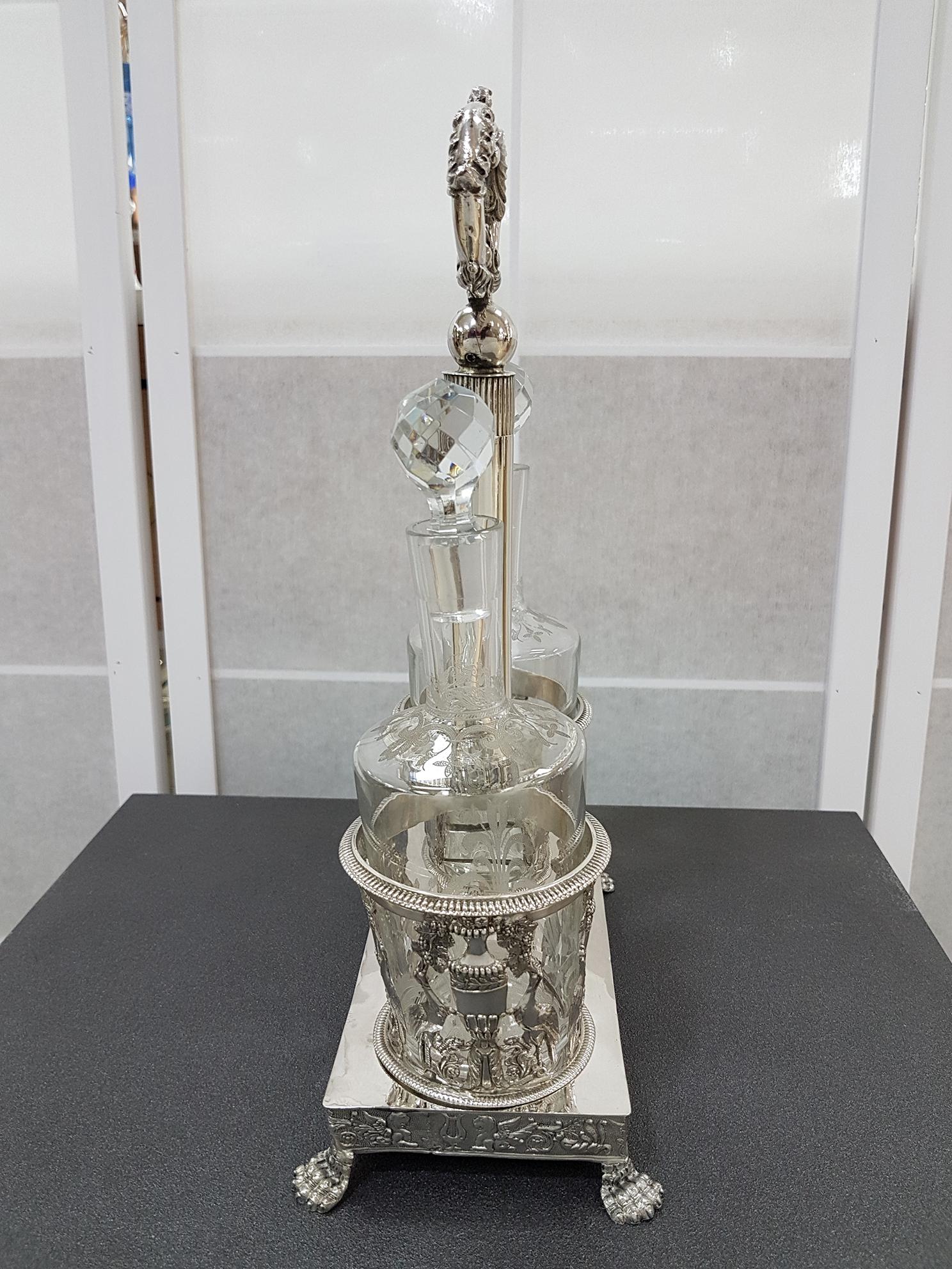 Silver cruet made by the silversmith from Turin, Gioanni Gilardi in 1824.
Rich and elaborate decoration composed of numerous decorative elements, such as herons, masks, flower garlands, cupids and musical instruments.