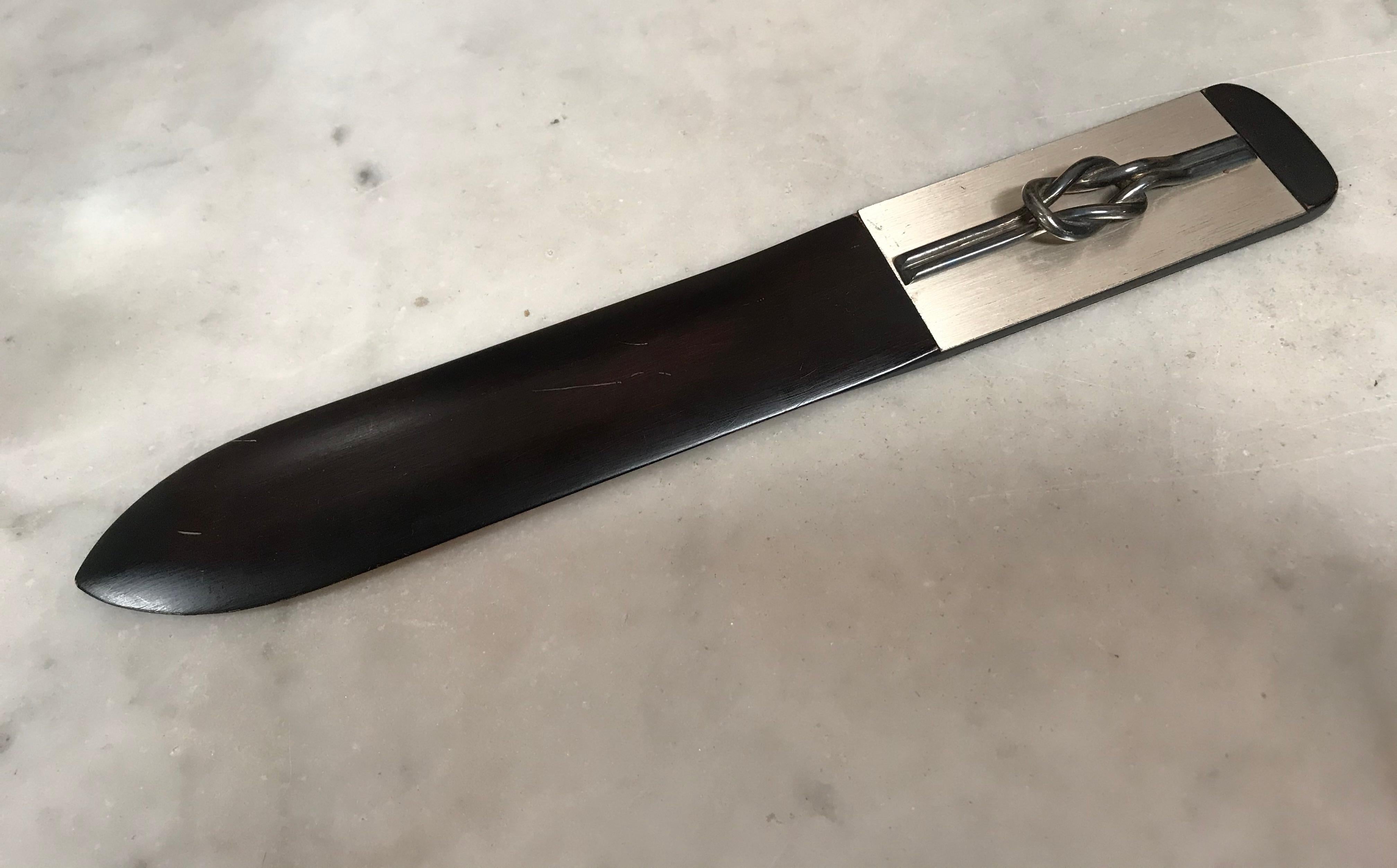 Italian silver and black wood turner letter opener.
Good vintage condition.