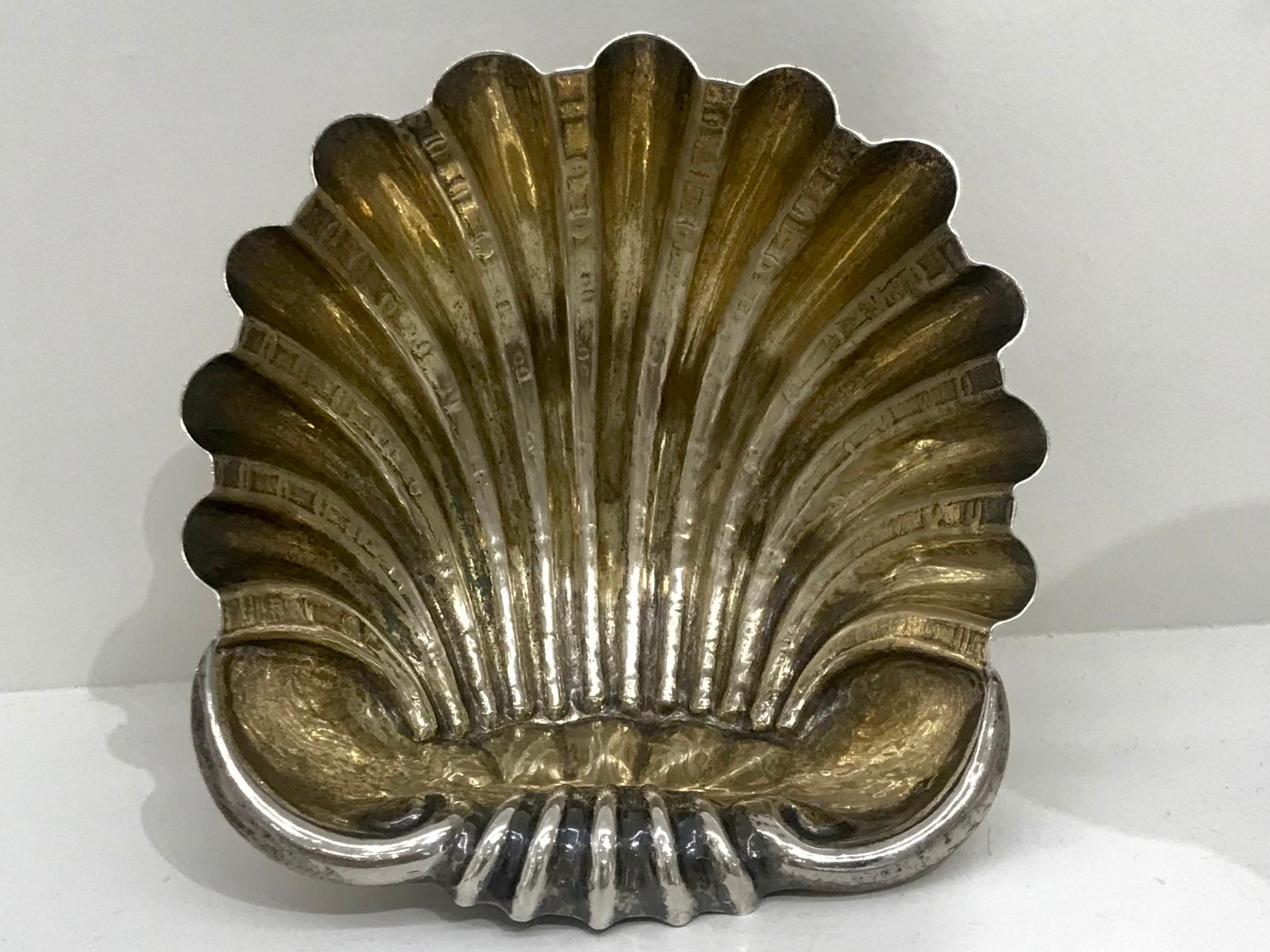 Italian silver and vermeil shell dish. Vermeil wash rocaille form dish on shell feet in the manner of Missiaglia, Italy, circa 1940.
Dimension: 5.88