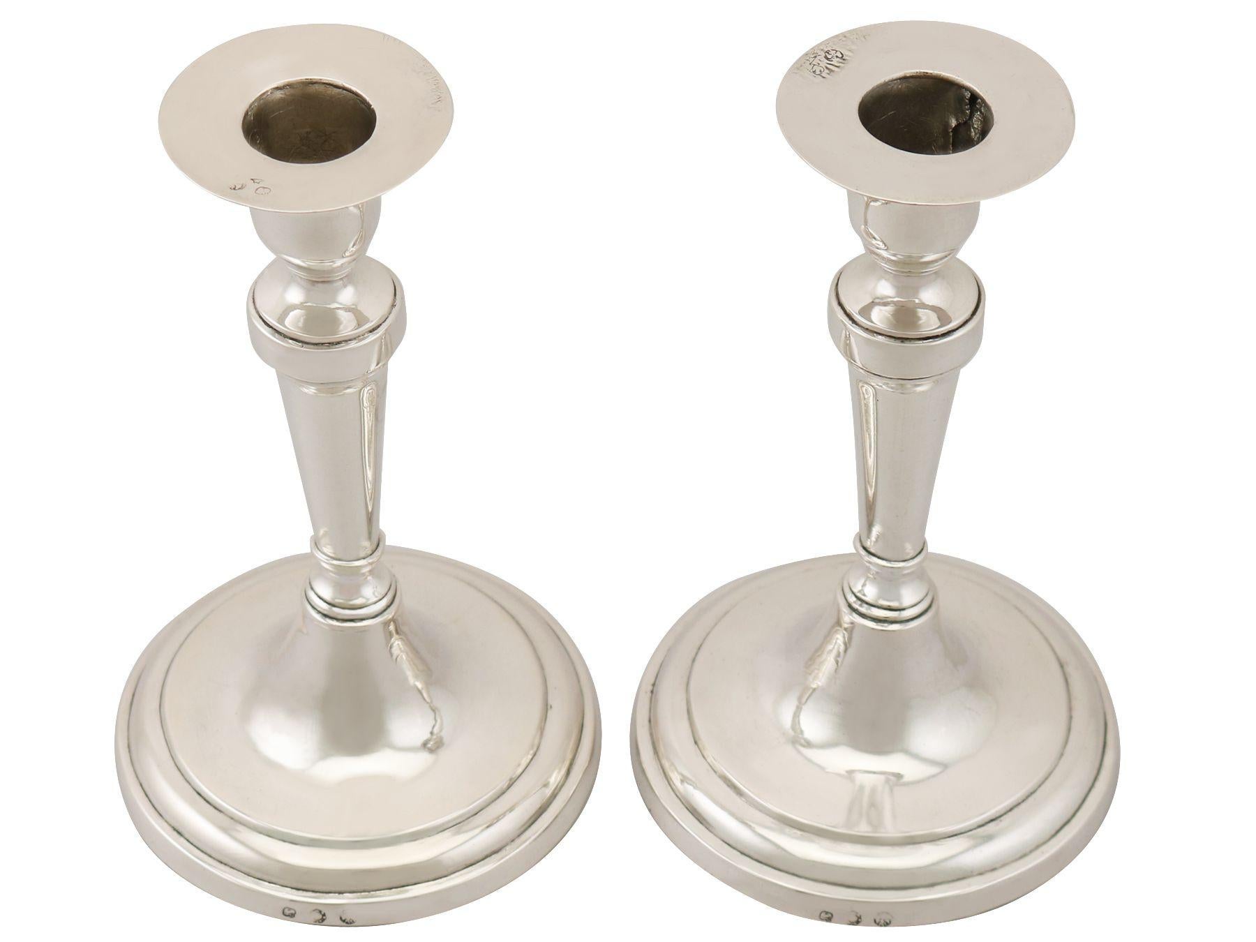 An exceptional, fine and impressive pair of antique Italian silver candlesticks; an addition to our continental silverware collection.

These exceptional antique Venetian silver candlesticks have a circular rounded form to a circular spreading