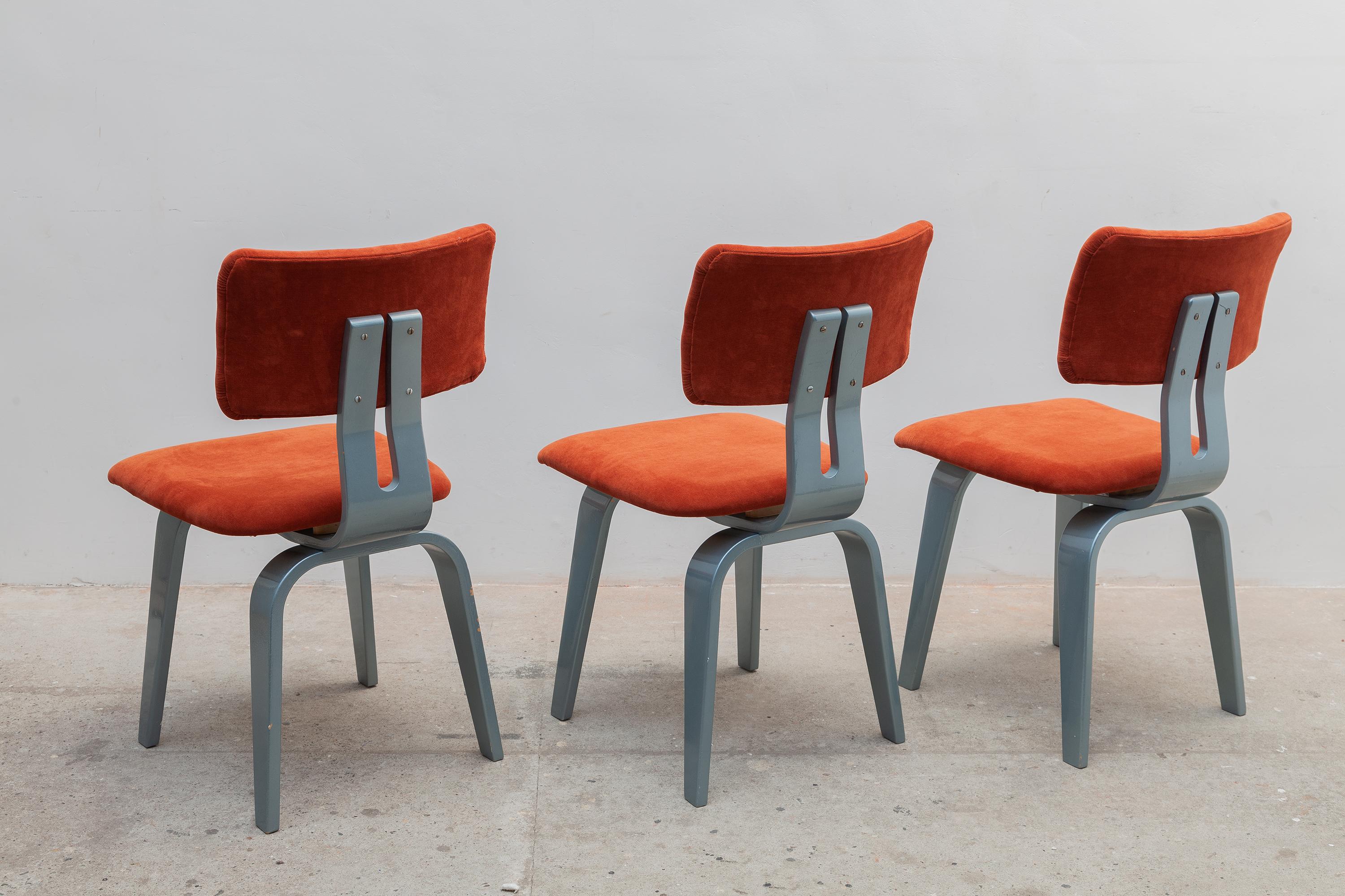 Vintage 1970s Italian chairs. Gunmetal silver lacquer frames with sculpted legs. Bright orange velveteen upholstery. Dimensions: 42W x 80H x 50D cm Seat: 45cm high.