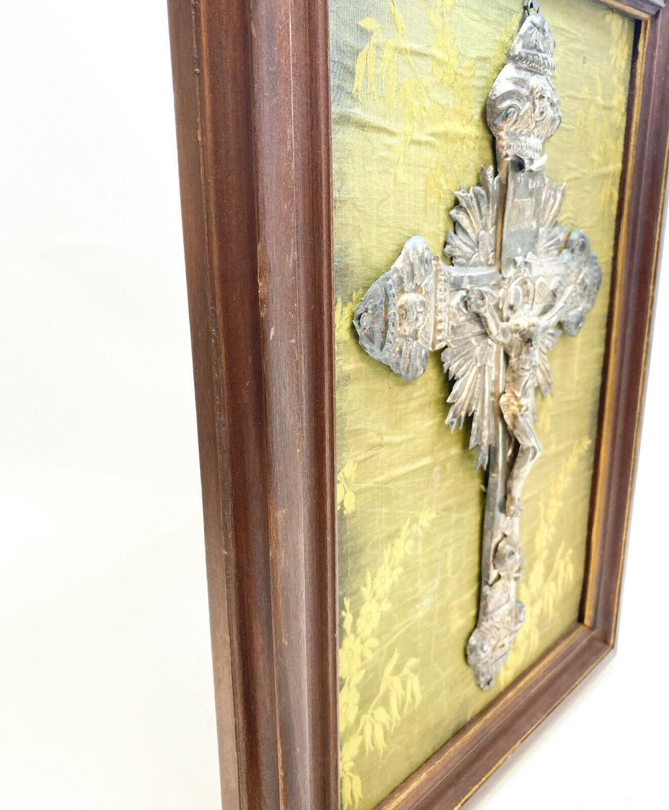 crucifix above screen
