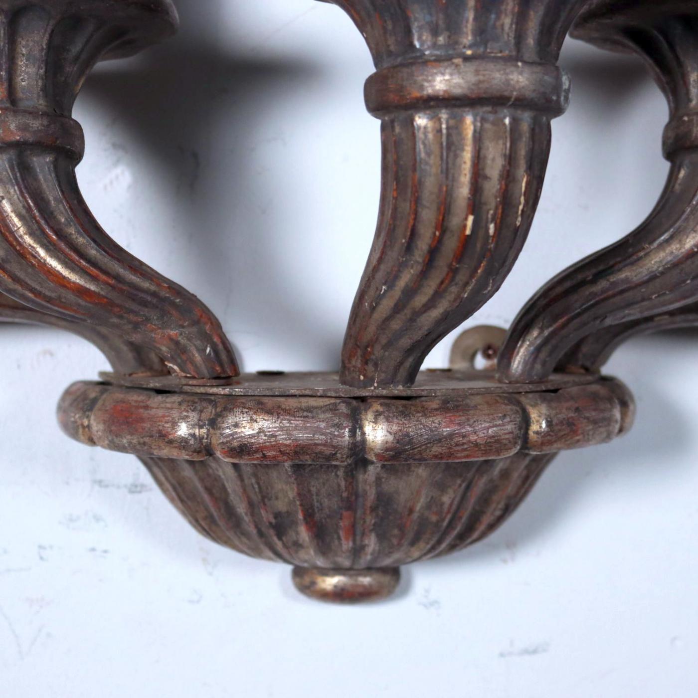 comprising five carved boldly reeded candle arms gadrooned urnform terminal. 