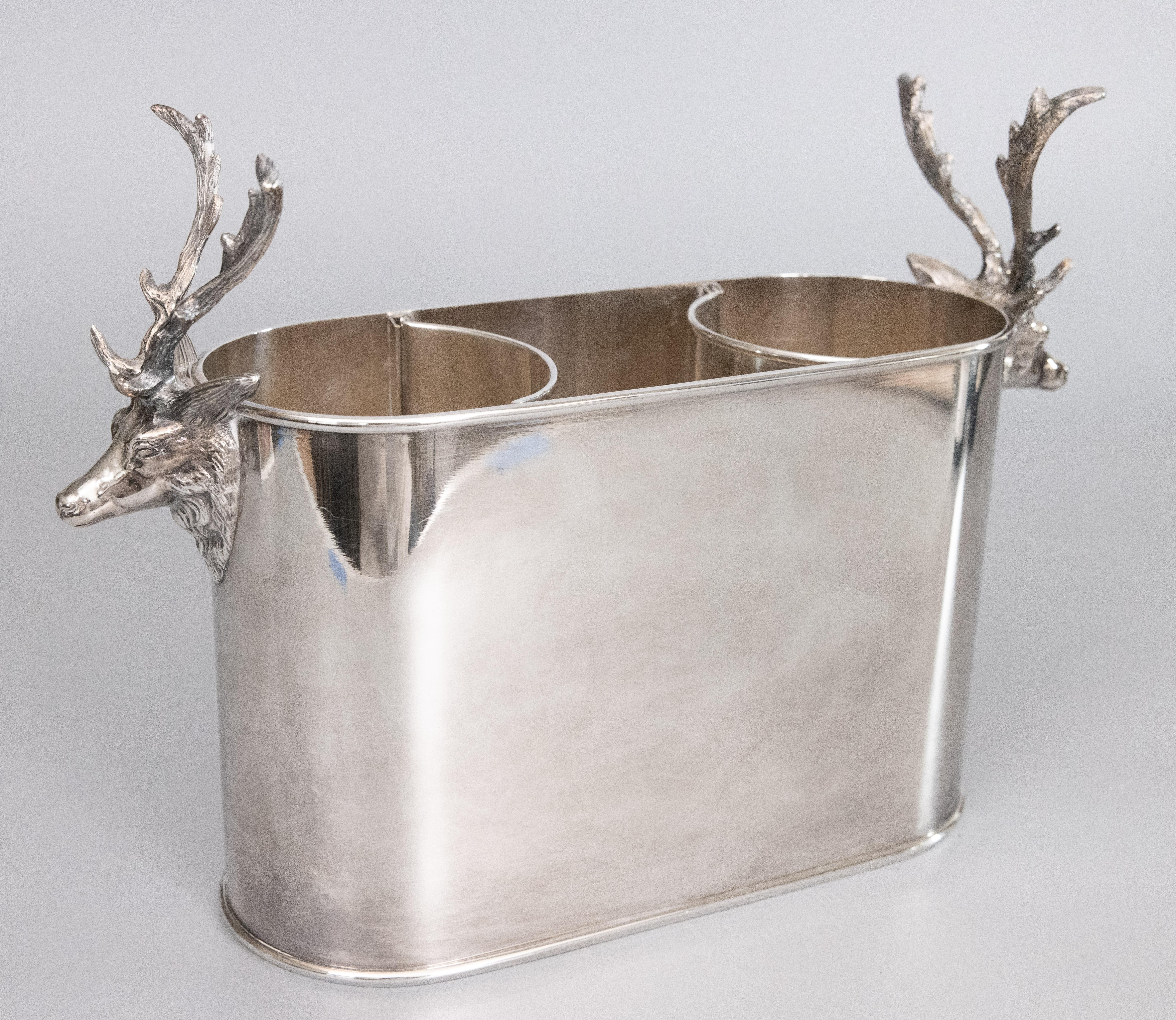 A fabulous Italian silver plated double champagne ice bucket or wine cooler with stag / elk head handles, circa 1960. Marked 