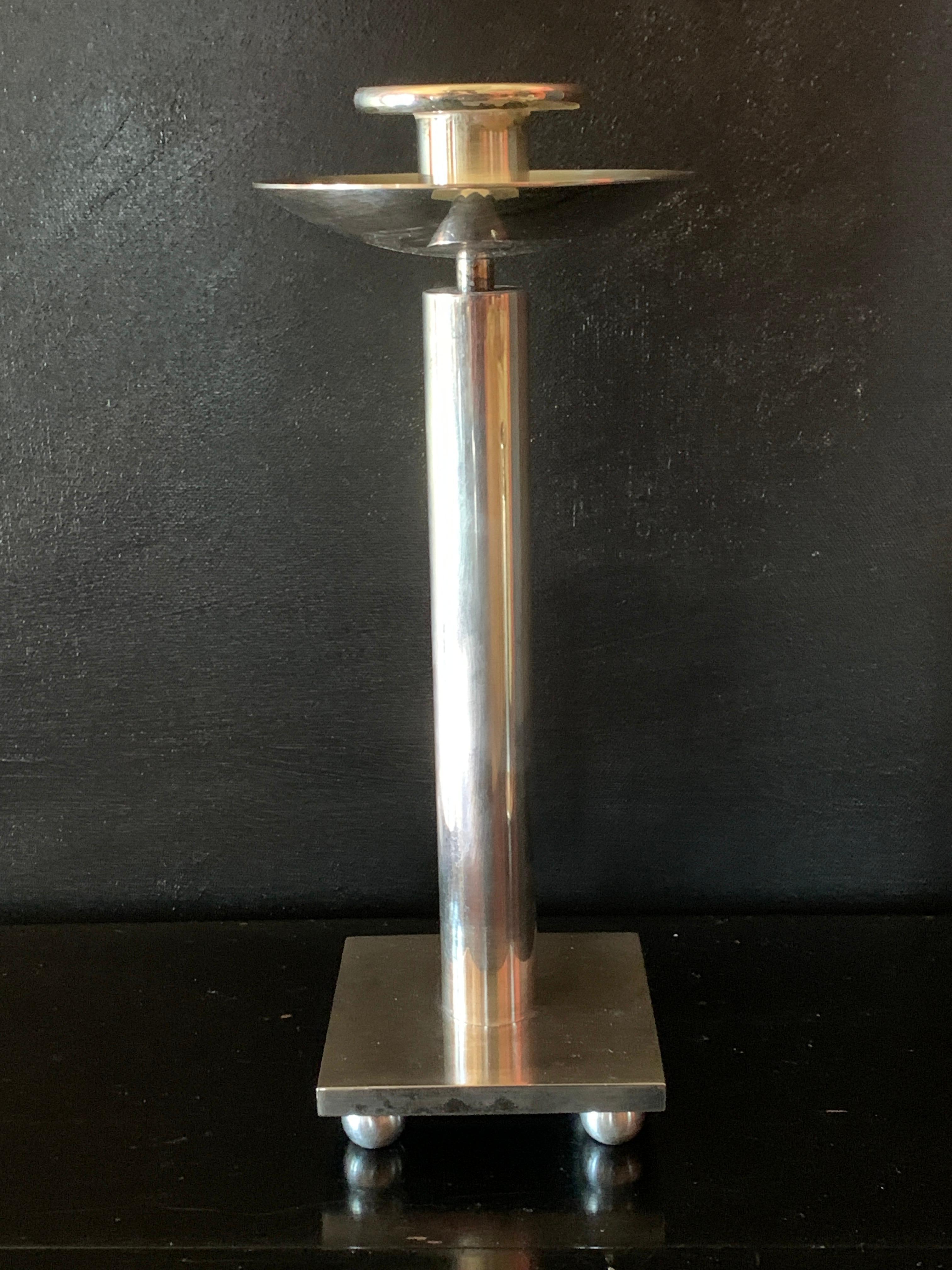 Stunning and architectural, silver plate candle stick by Architect Richard Meier for Swid Powell - a collectors dream!

Simple, yet stunning and very solid - Because of provenance and streamline look, the candle stick can be as appealing in any