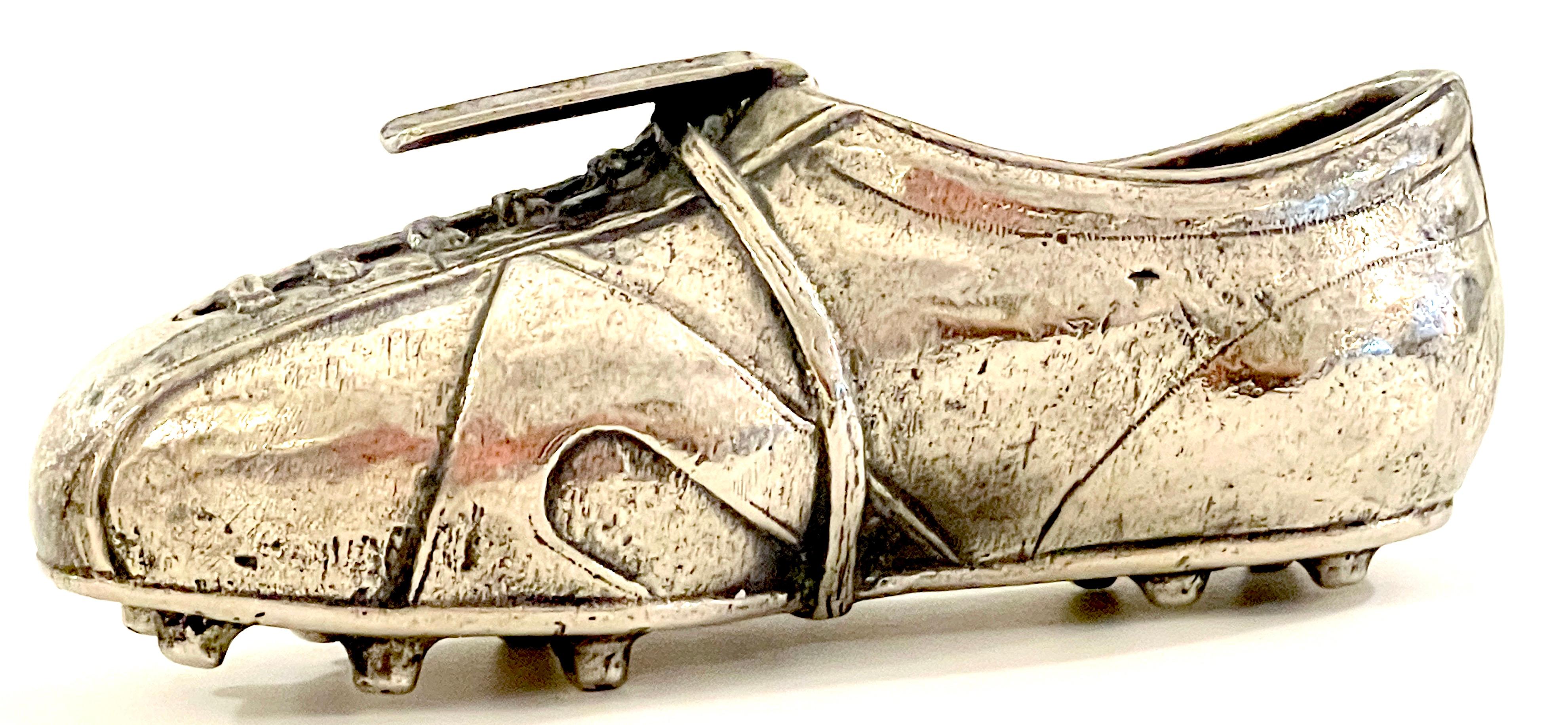 Italian silverplated football/ soccer Cleat ashtray 
Realistically cast and modeled as Football/ Soccer Cleat, a diminutive piece, suitable for individual use. 
Stamped 'PEI JPG Italy' 
Overall Measurements :
4-Inches wide x 1.5-Inches high x