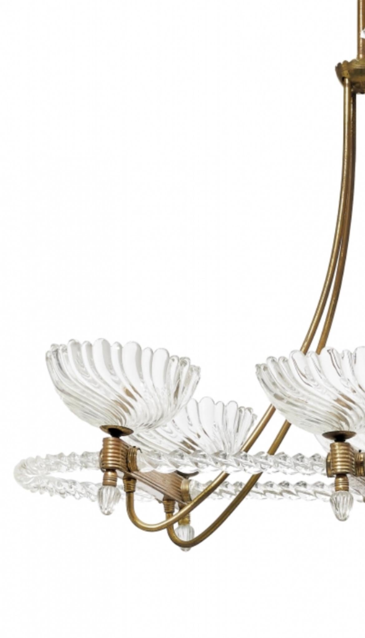 Beautiful six-light chandelier in brass, blown and hot moulded Murano glass, by Seguso, Italy 1940s.