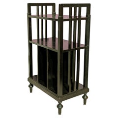 Pequeña librería italiana de madera teñida de negro de los años 30