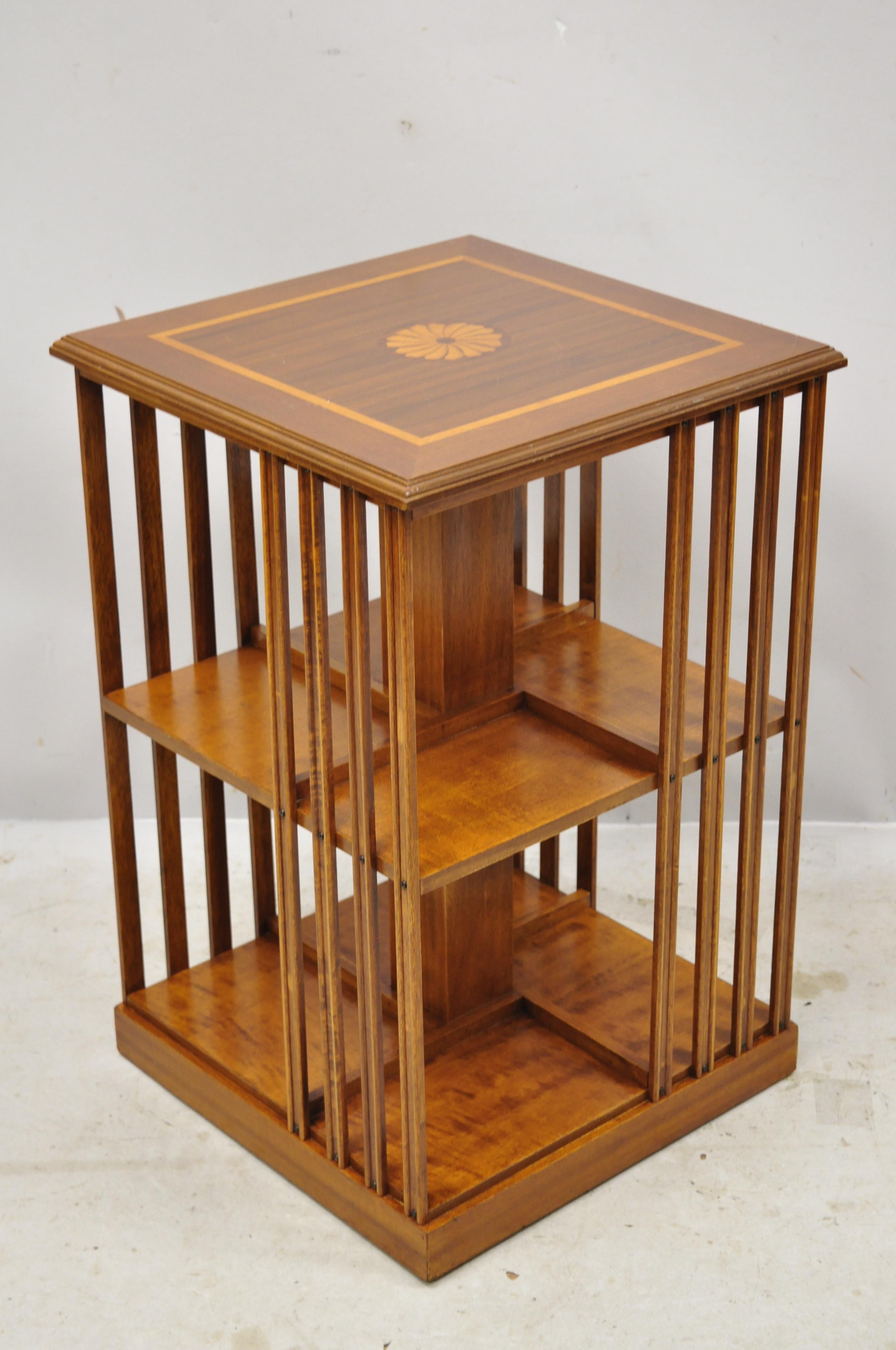 Vintage Italian small low revolving base Danner style bookcase with pinwheel inlay side table. Item features satinwood pinwheel inlay, revolving base, beautiful wood grain, marked 