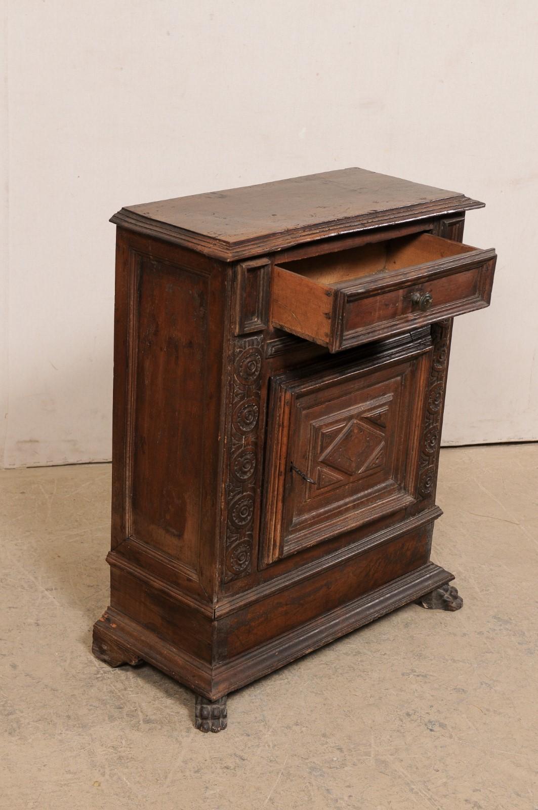 Wood Italian Small-Sized Carved Walnut Cabinet on Paw Feet, Turn of 17th & 18th C. For Sale