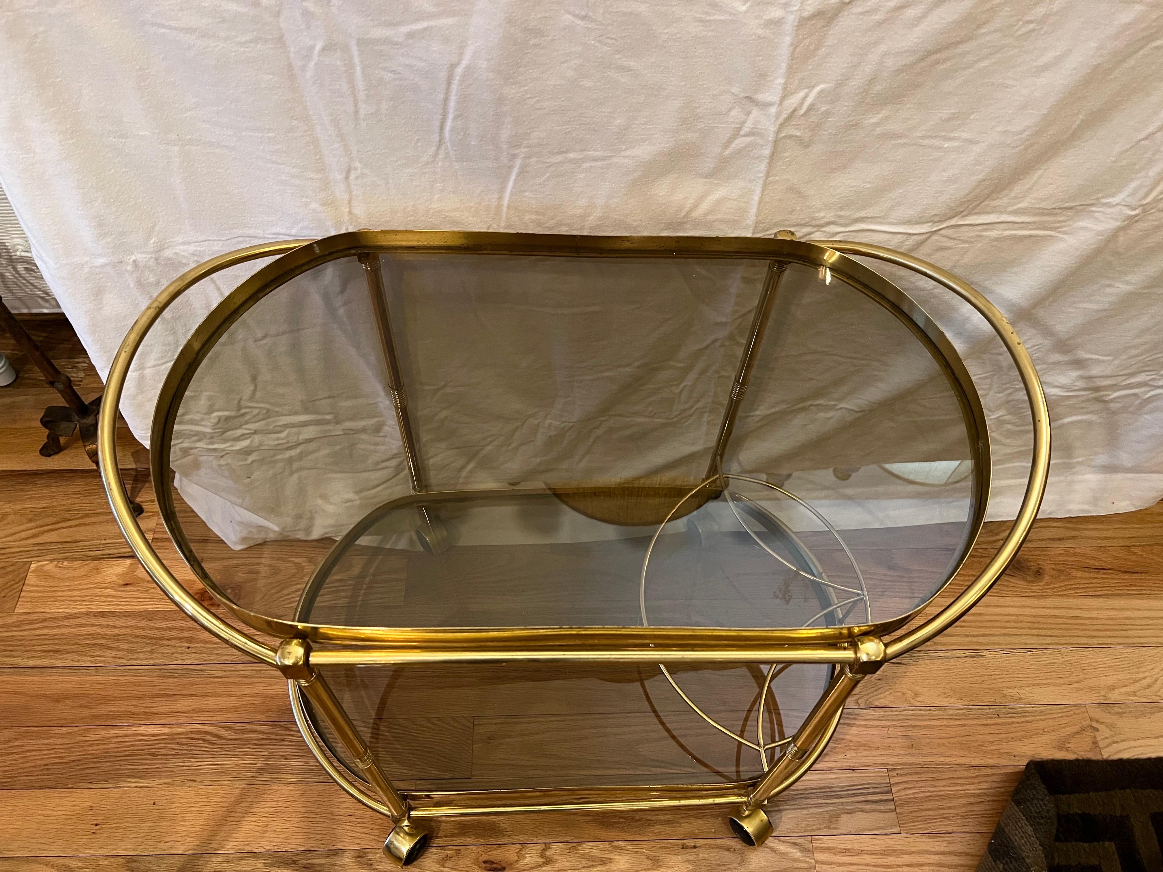 Italian Smoked Glass Two Tiered Oval Bar Cart In Good Condition In Redding, CT