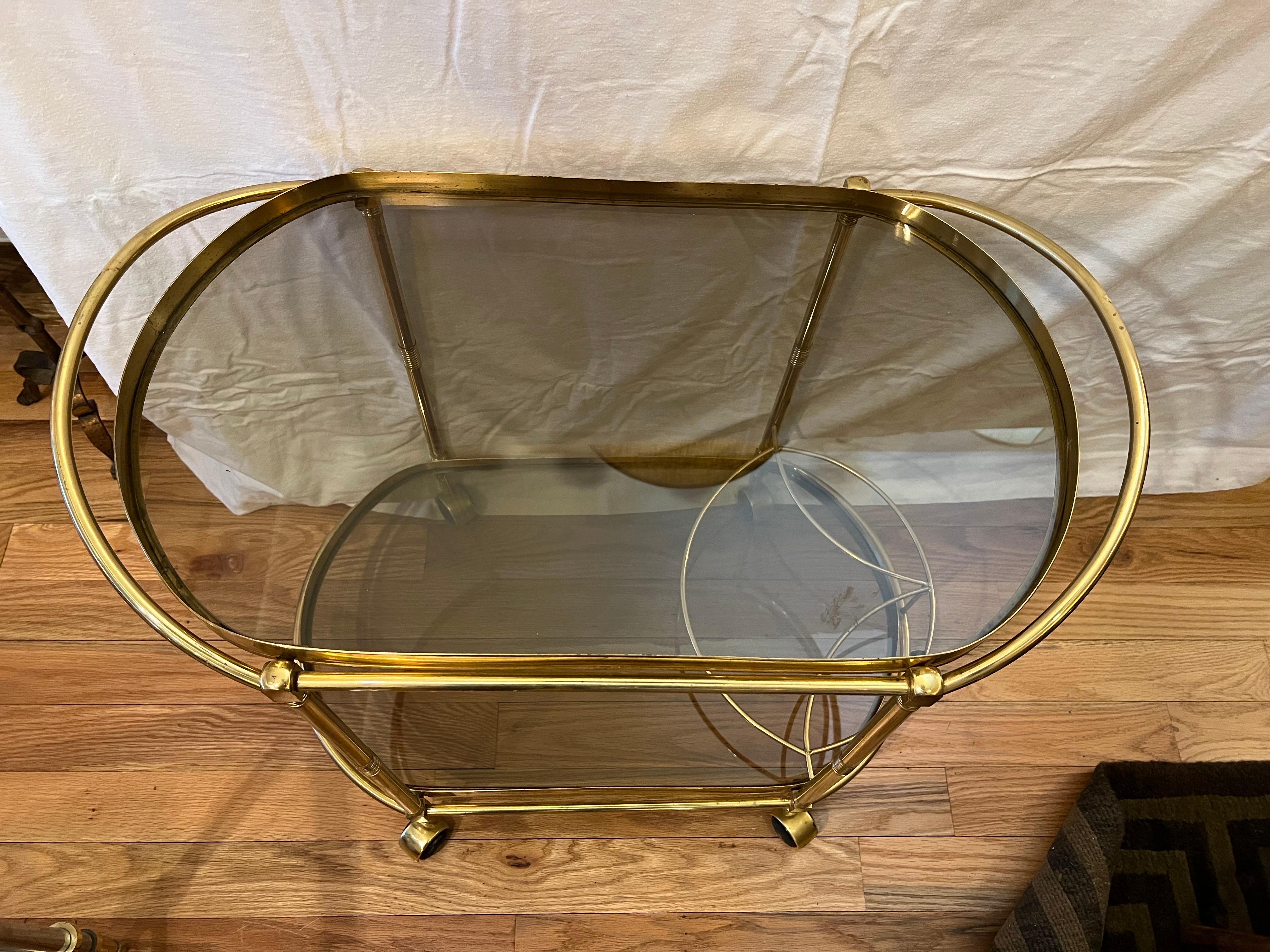 Late 20th Century Italian Smoked Glass Two Tiered Oval Bar Cart