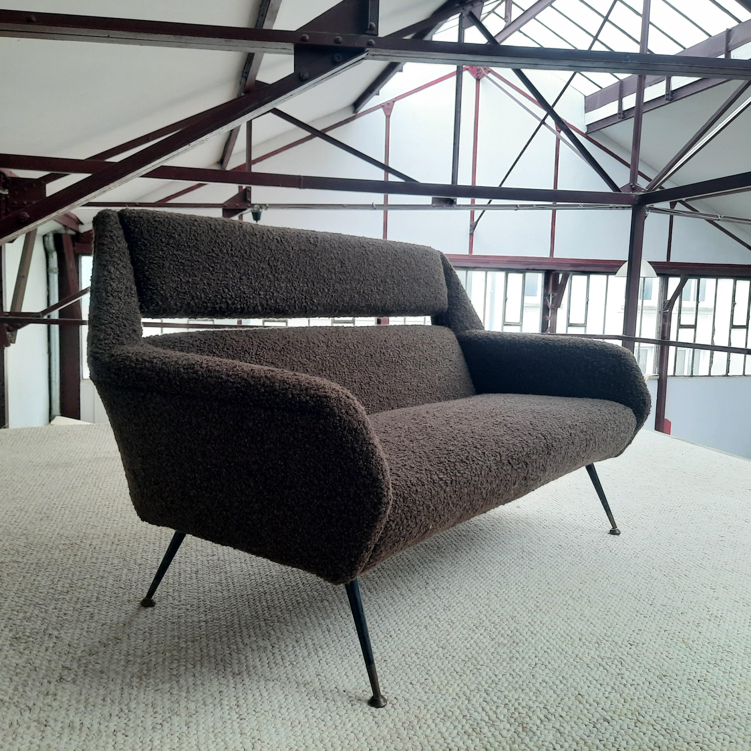 Italian sofa from the 1950s, in the style of Marco Zanuso. Original wooden structure, restored with a chocolate bouclé fabric from Designers Guild. Oblique metal base.