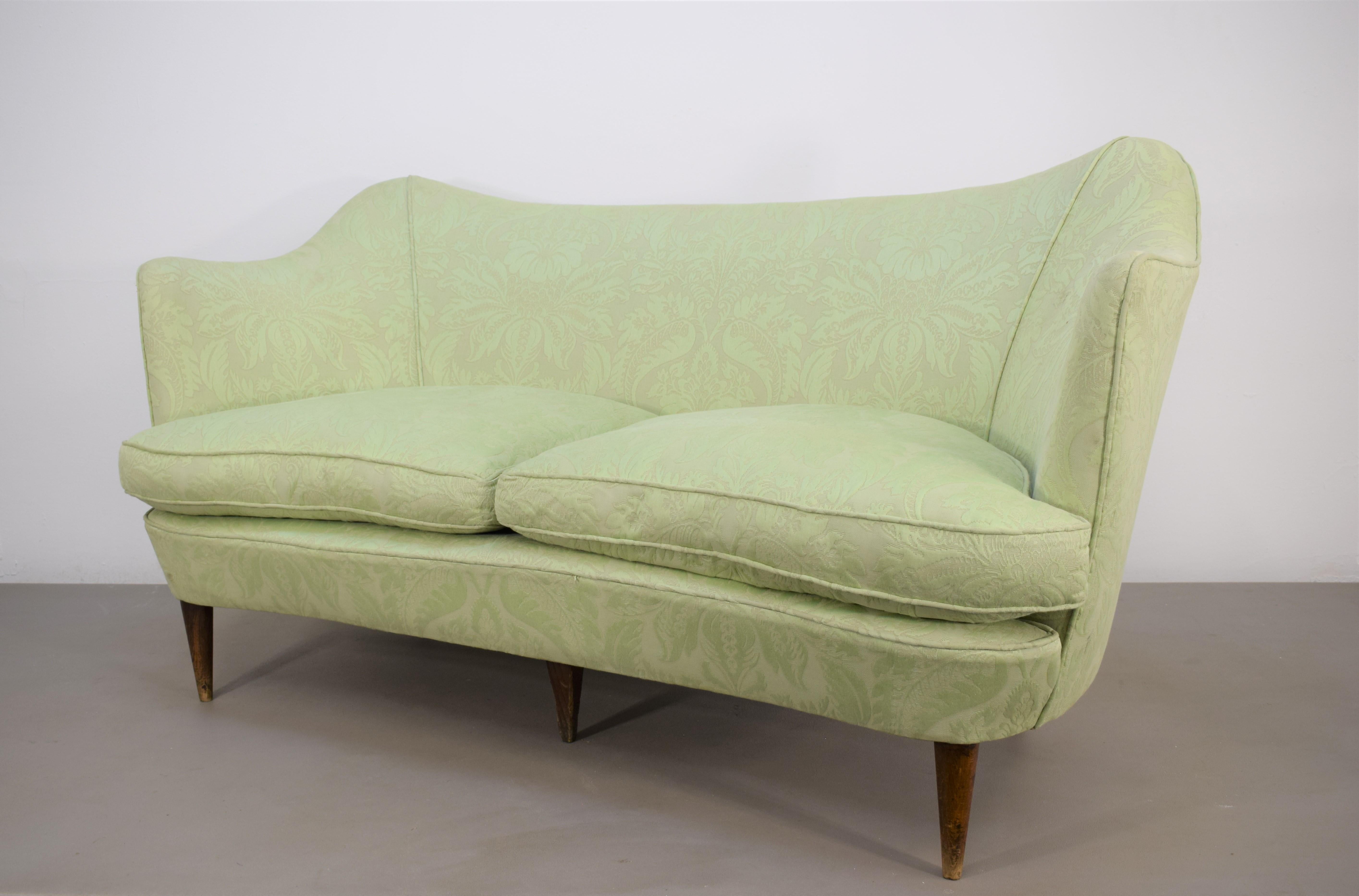 Italian sofa by Casa e Giardino, 1950s.

Dimensions: H= 75 cm; W= 142 cm; D= 75 cm; H seat= 38 cm.