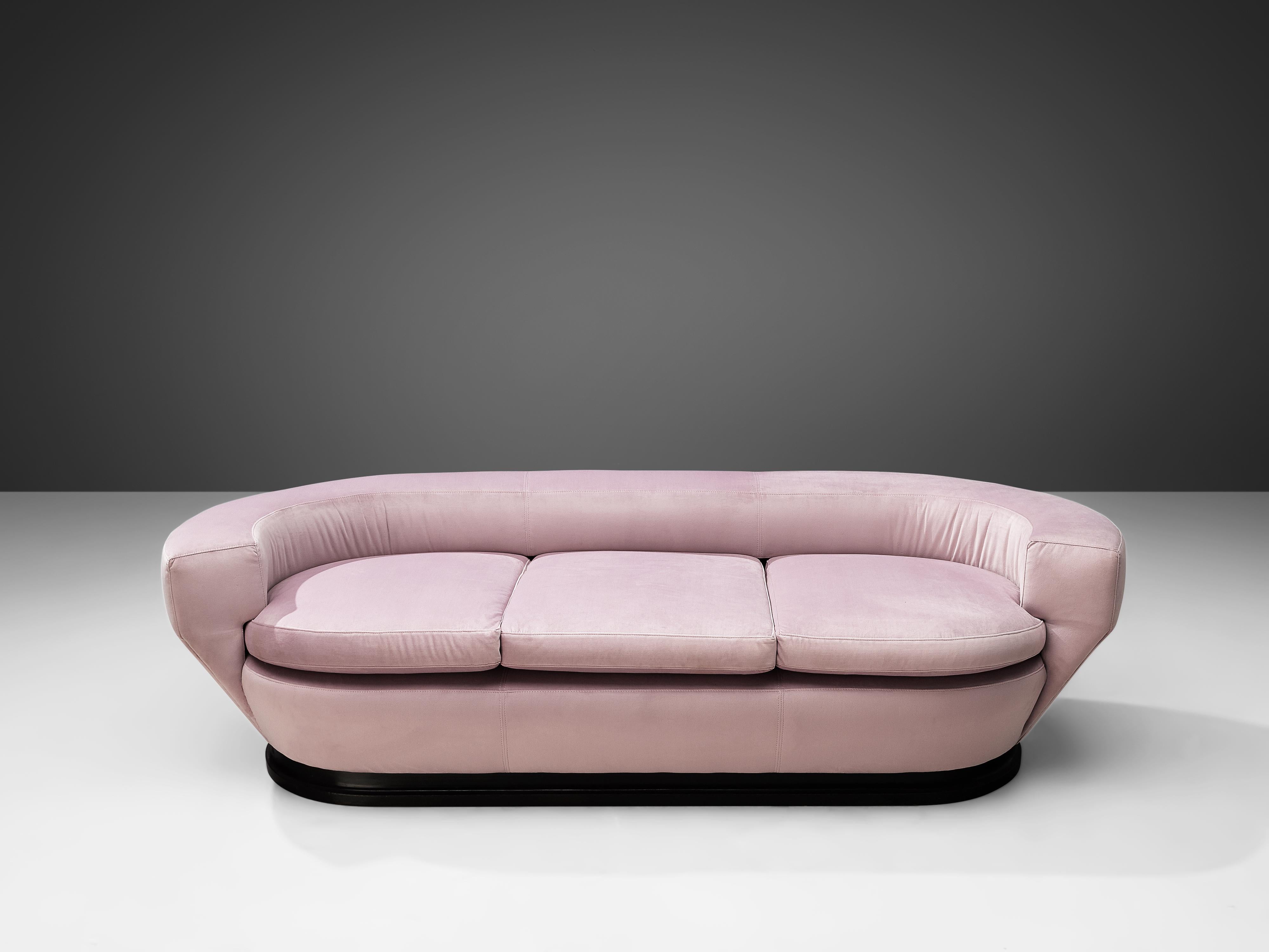 Three-seat sofa, ultrasuede, darkened wood, Italy, 1960s

This beautifully shaped sofa features a well-proportioned construction of round shapes and fluent lines. The backrest functions as a shell that embraces the sitter wonderfully and merges