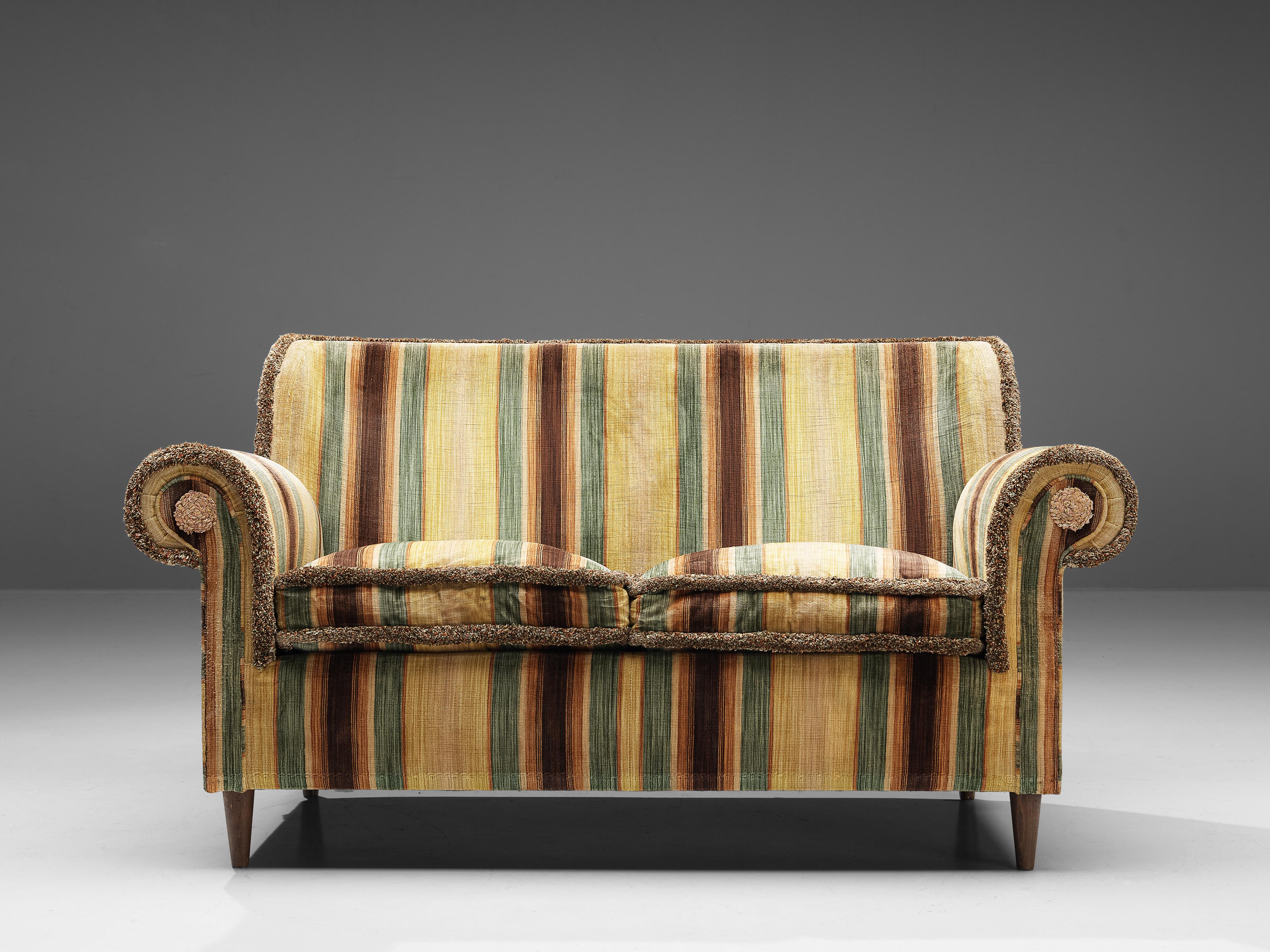 Sofa, fabric, beech, Italy, 1960s

This charming Italian sofa comes with a characteristic velvet upholstery of stripes differing in width and color tones of yellow, brown, orange and green. The design has a certain theatrical aesthetic with curled