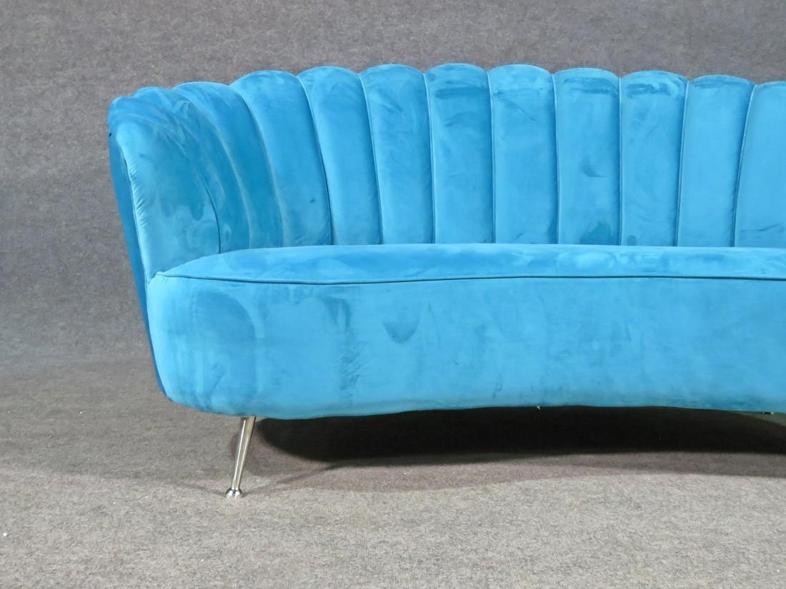 An incredible Italian sofa combining vibrant blue upholstery with chrome legs, styled after Gio Ponti. This unique sofa is a bold way to add vintage flair to any space. Please confirm item location with seller (NY/NJ).