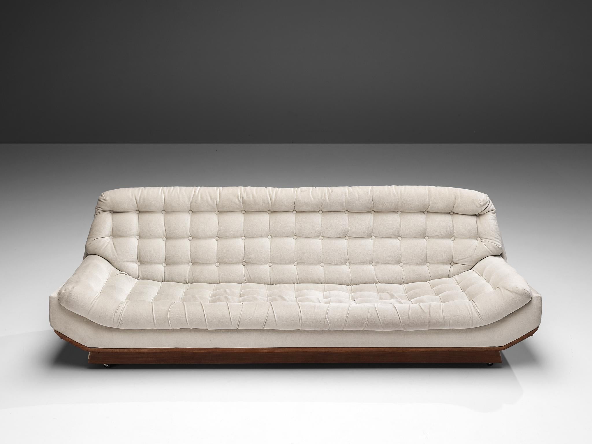 white tufted sofa