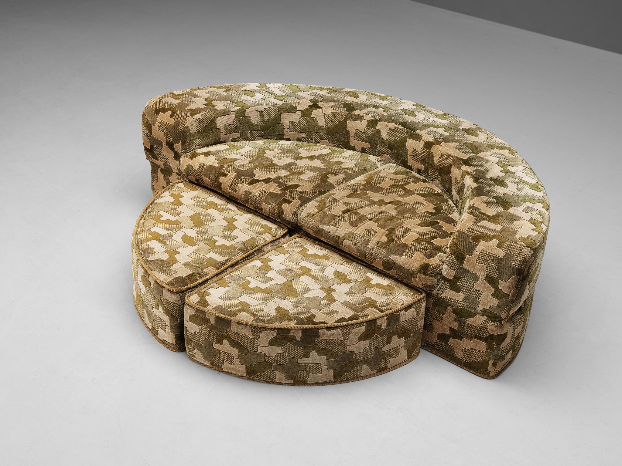 Sofa or bed, ottomans, fabric, Italy, 1970s 

Fun and nifty Italian sofa with ottomans that is easily transformable to a double bed. The upholstery of this gorgeous sofa features an illustrative pattern of differently sized patches that resemble a