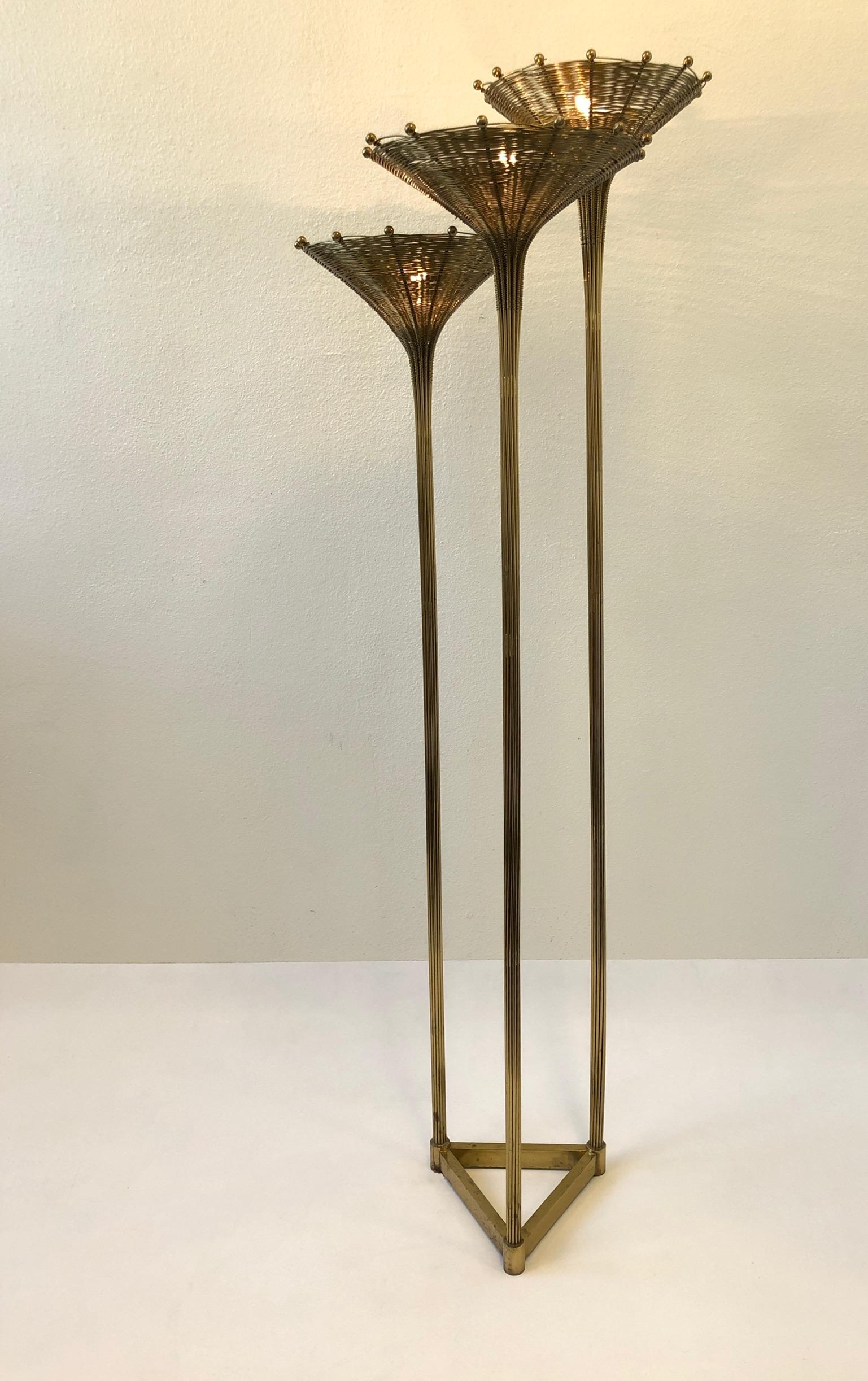 Italian aged brass “Papyrus” floor lamp design by Nucci Valsecchi in the 1970s.
The lamp is solid brass with some age to it (see detail photos). It can be polished if desired. Newly rewired.
Dimensions: 74” high 25” deep 26” wide.