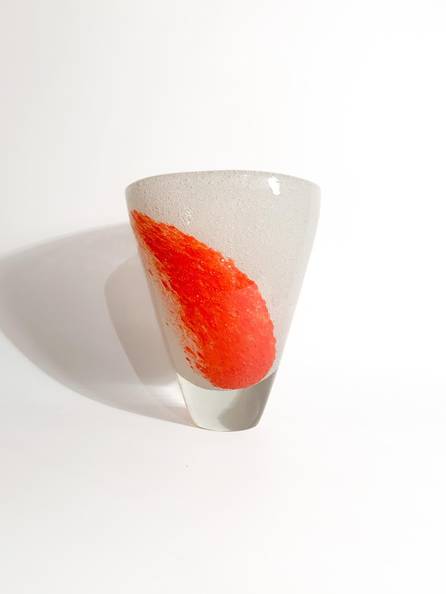 White and orange Murano glass vase, made with the submerged glass technique in the 1980s

Ø cm 16 Ø cm 11 h cm 20

The vase is elliptical in shape, made with the submerged glass technique, thus overlapping different layers of solid glass during hand