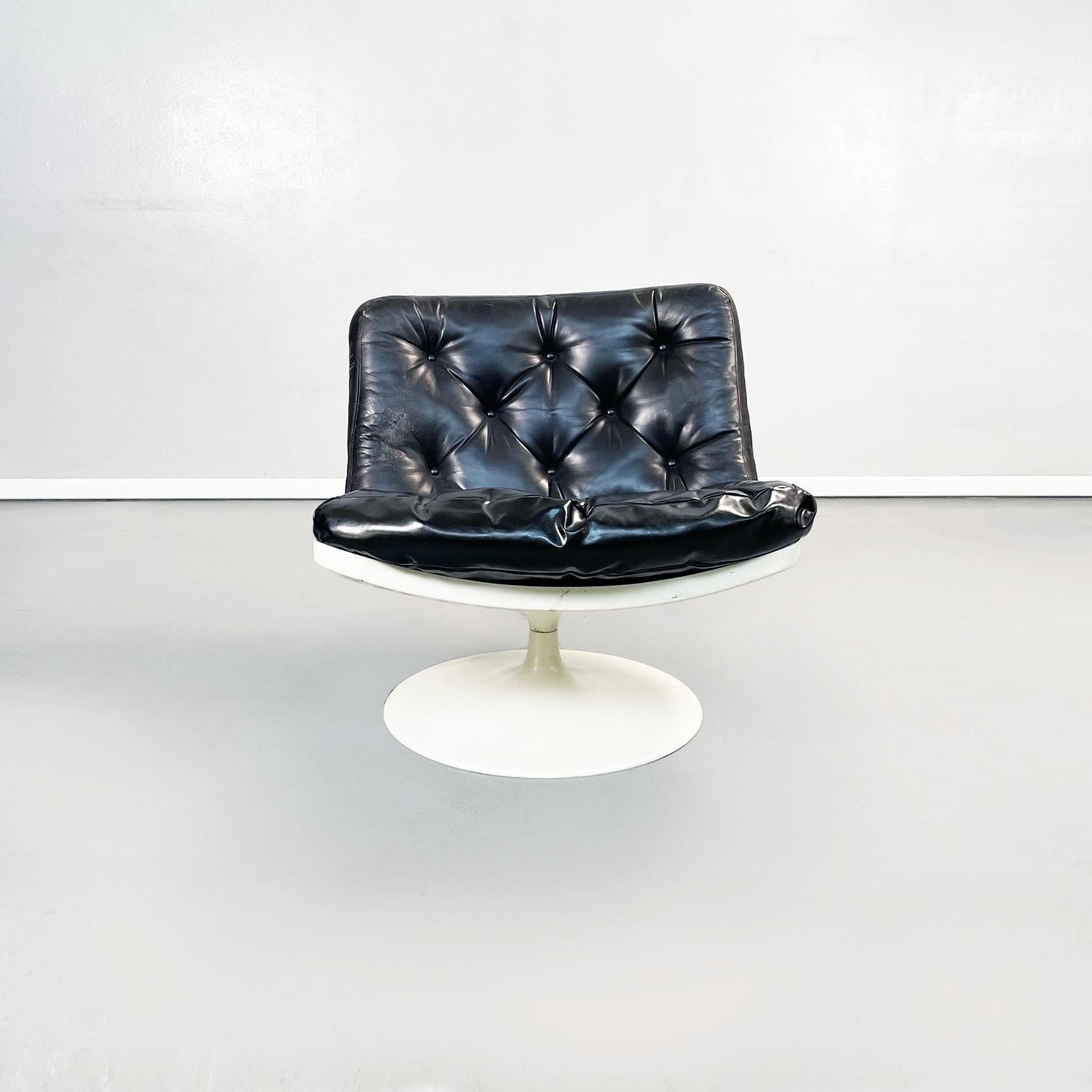 Italian space age Black leather and abs plastic armchair by Play, 1970s.
Armchair with Tulip style round base, in white swivel abs. The seat and back are composed of two padded and stitched cushions in black leather.
Produced by Play in 1970s.