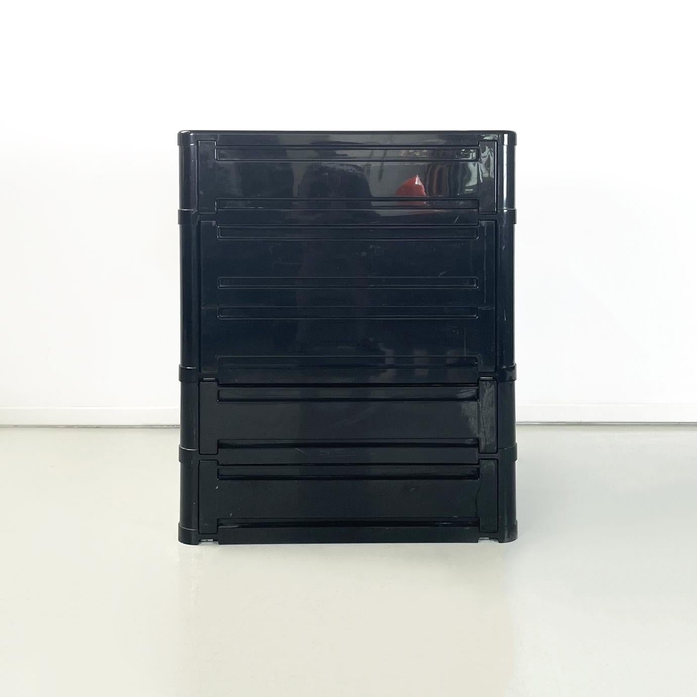 Italian space age modular chest of drawer 4964 in black plastic by Olaf Von Boh for Kartell, 1970s
Modular chest of drawers mod. 4964 with a rectangular base with rounded corners, in black plastic. The shoe rack is made up of 4 modules and each