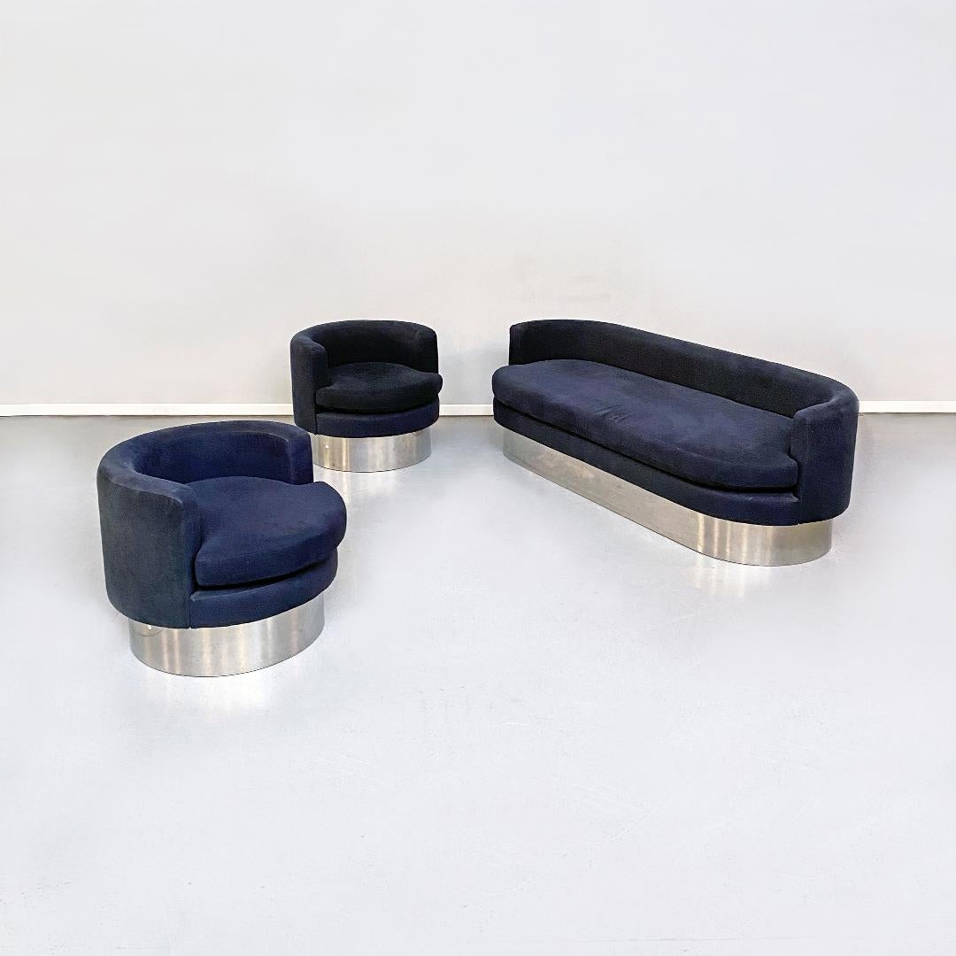 Italian space age black velvet and chromed steel sofa and armchairs, 1970s
Sofa and a pair of armchairs in velvet partly black and partly midnight blue, with steel band along the entire support structure.
1970s
Good general conditions.
Armchair