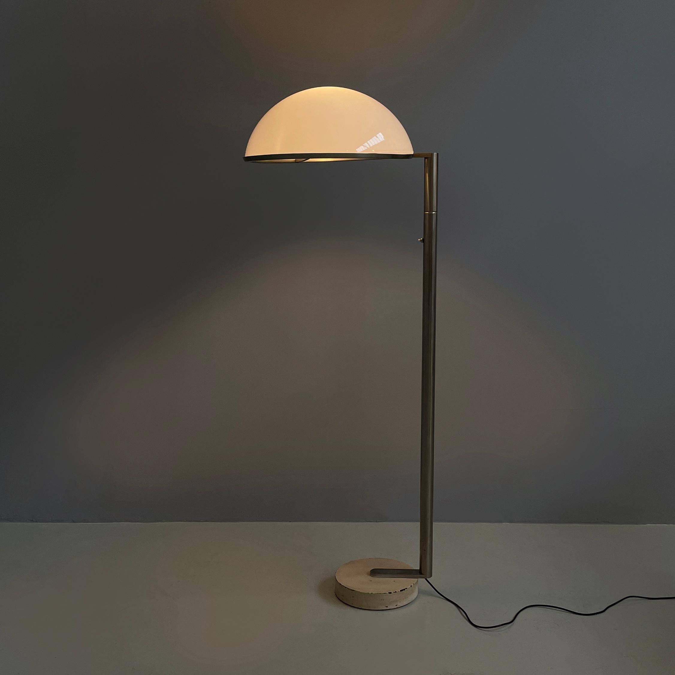 Italian space age Floor lamp in white plastic and metal by Arteluce, 1970s
Floor lamp with opaline plastic dome lampshade with lower metal profile. The bulb is supported by 3 metal arms.The round metal section structure is C-shaped. The switch is