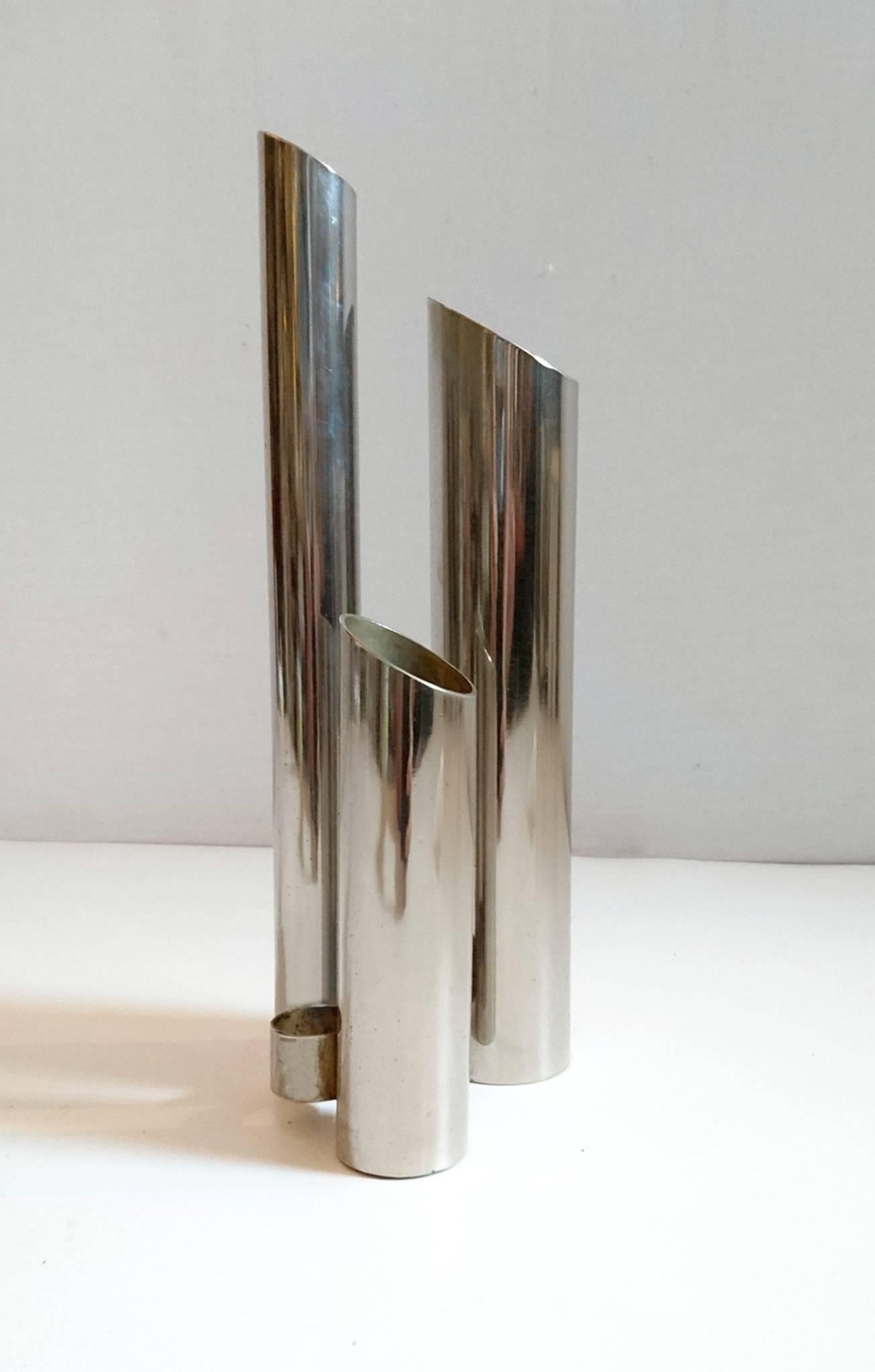 Mid century modern space age vase in chrome with three tubes for flowers in the manner of Gio Ponti. 