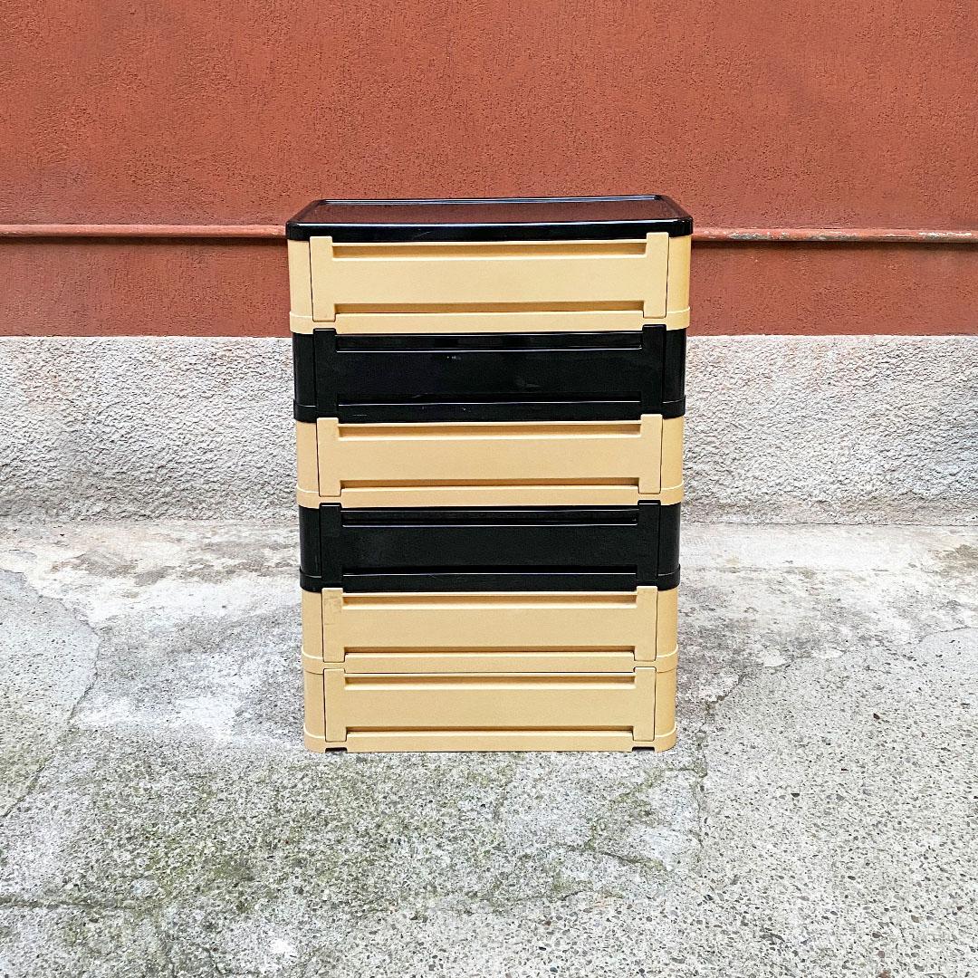 Italian space age modular chest of drawers mod. 4964 by Olaf Von Bohr for Kartell, 1970s
Modular cream and black plastic chest of drawers, with flap opening, usable as a shoe rack.
Designed by Olaf Von Bohr for Kartell, 1970s, with logo on the