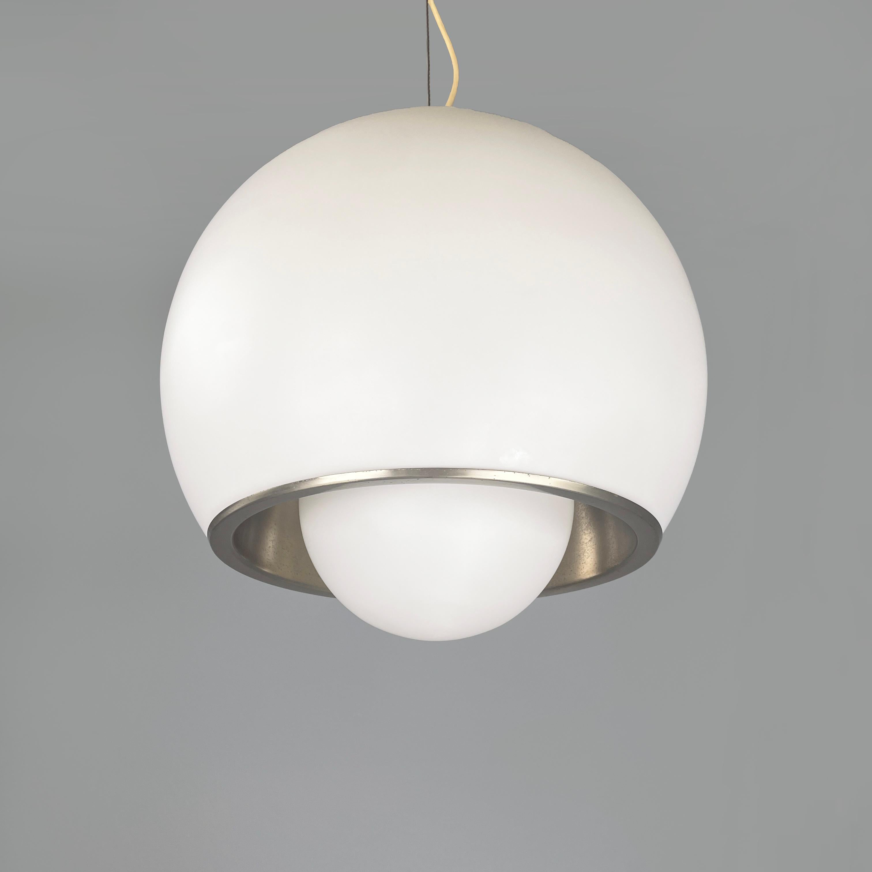 Italian space age Opaline glass steel chandelier by Fontana Arte, 1940s
Chandelier in matte opaline glass and steel. The dome diffuser has a chromed steel band in the center and an opaline glass sphere underneath. Inside the diffuser there are 7 E27