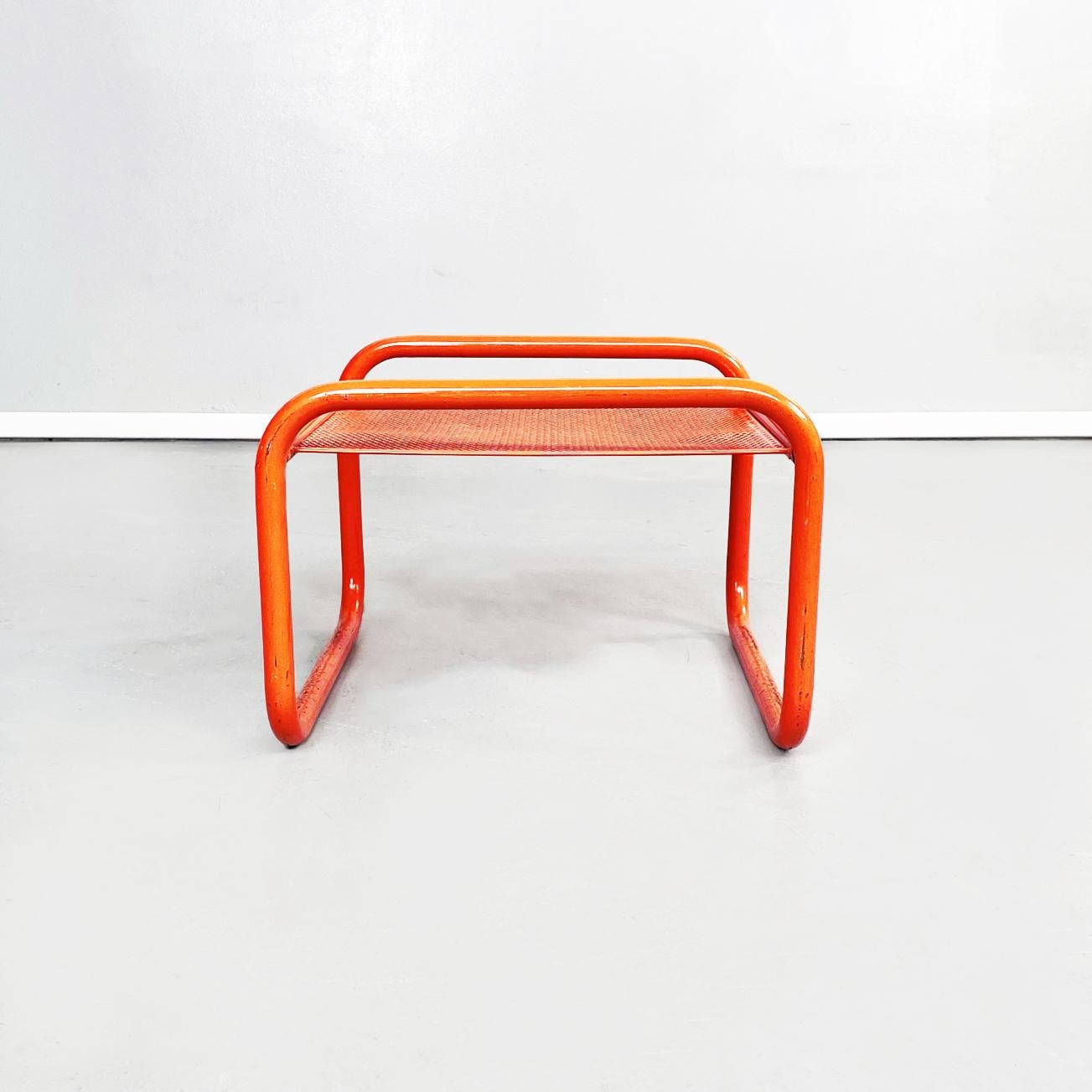 Beautiful and very rare Italian mid-century Orange Footstools Locus Solus by Gae Aulenti for Poltronova, 1960s
Pair of footrests from the series Locus Solus in orange painted metal. The rectangular top is perforated. The structure is in