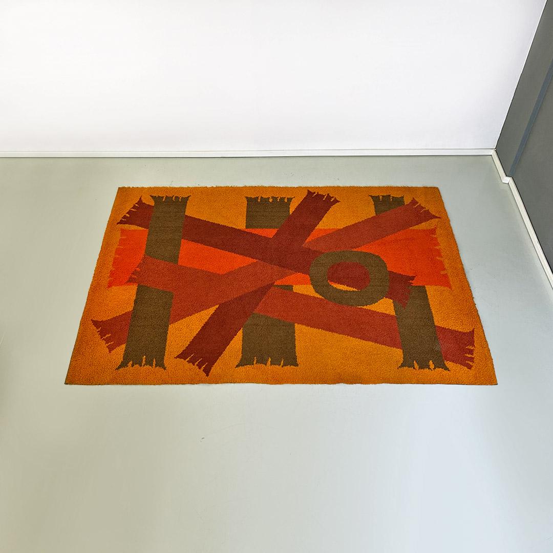 Italian space age various shade of red orange and brown short pile rug with geometric pattern, 1970s
Short-pile rug, with design in various shades of red, orange and brown and with an abstract geometric pattern.
1970s approx.
Good conditions.