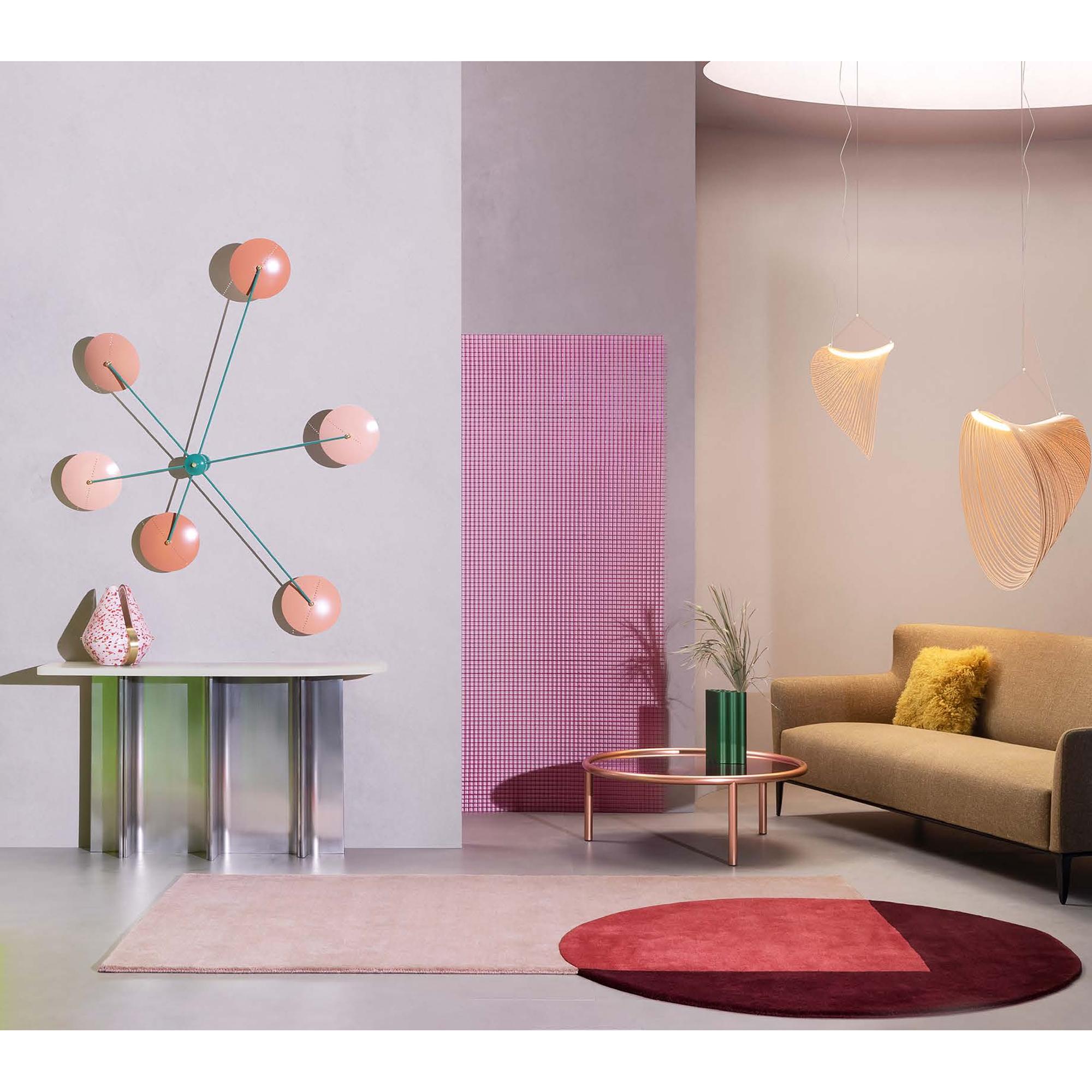 An attractive architectural ceiling lamp with the arms radiating all around the stem, ending with a shade, in pink shades and oil blue.
Inspired by the Italian midcentury designs, this wall light will be the focus center of your interior. 
EU wired