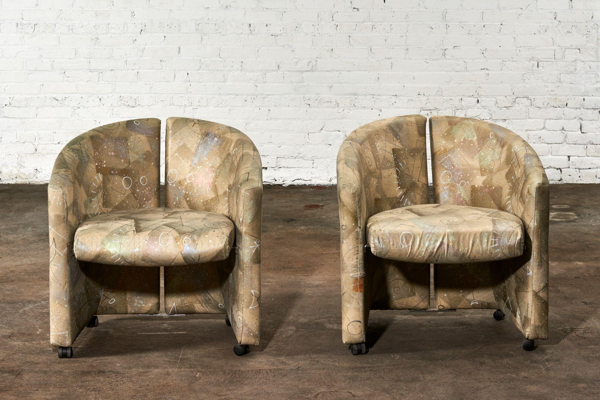 Italian split back barrel chairs, 1970. Original upholstery in great condition on casters.