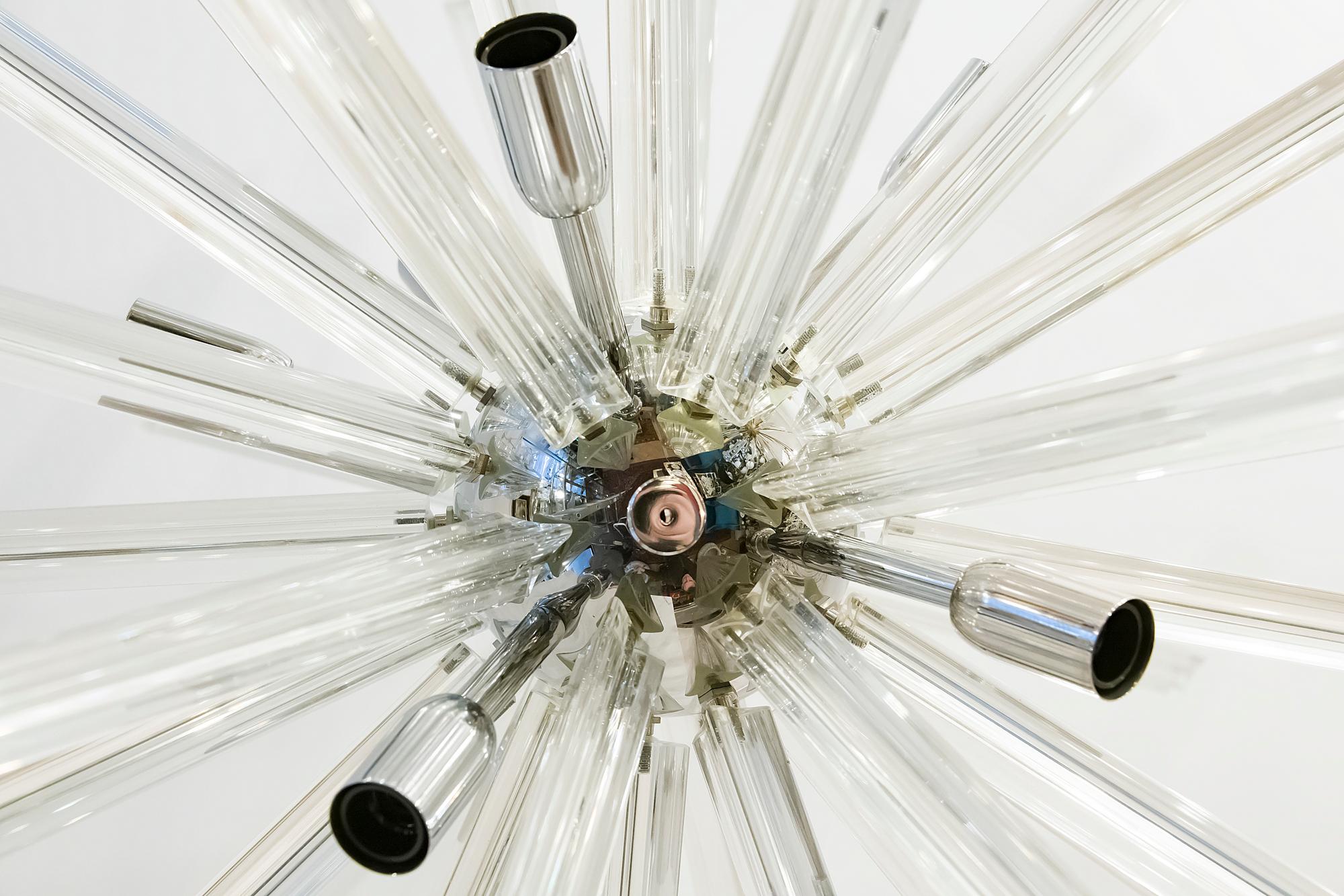 Italian Sputnik design chandelier is made of chrome base and clear Murano glass details. This chandelier includes 9 pcs. E27 bulbs. Its is in a very good original vintage condition.

 