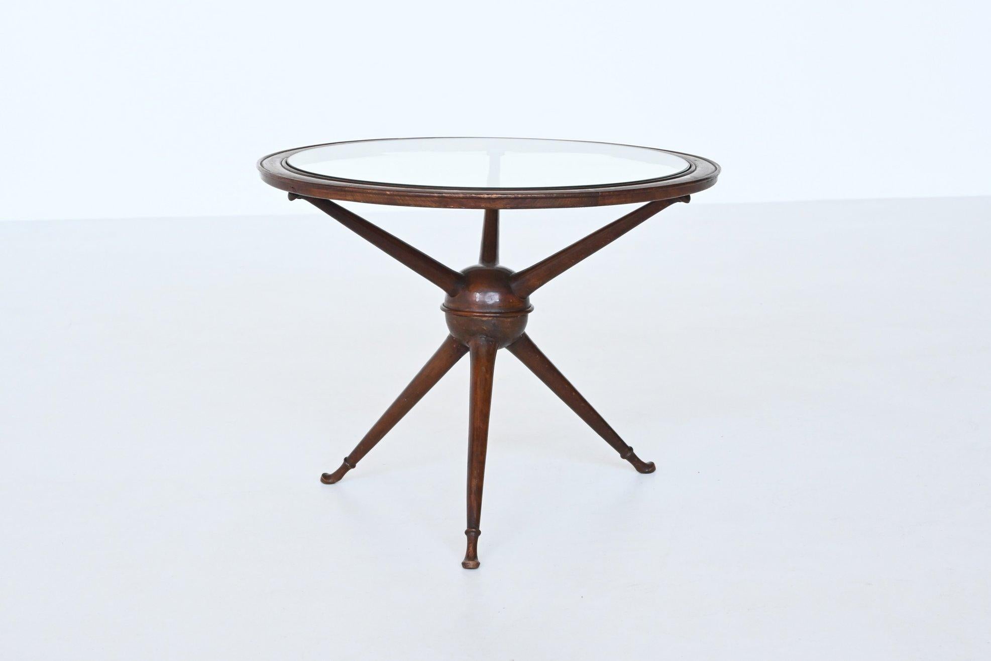 Beautiful Sputnik shaped Italian side table in the style of Carlo di Carli and Cesare Lacca, Italy 1950. This elegant coffee or side table has a very nice tripod base that supports a nicely detailed round top with an inlayed glass plate. The base is
