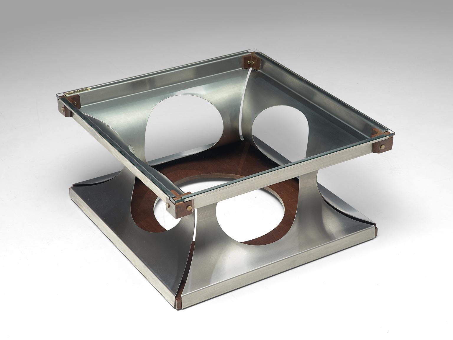 Coffee table, metal, wood and glass, Italy, 1970s

Cocktail table made of wood, steel and glass. It consists of four parts of folded steel plates with round cutouts, with a square shaped clear glass top. The corners are finished with wooden and