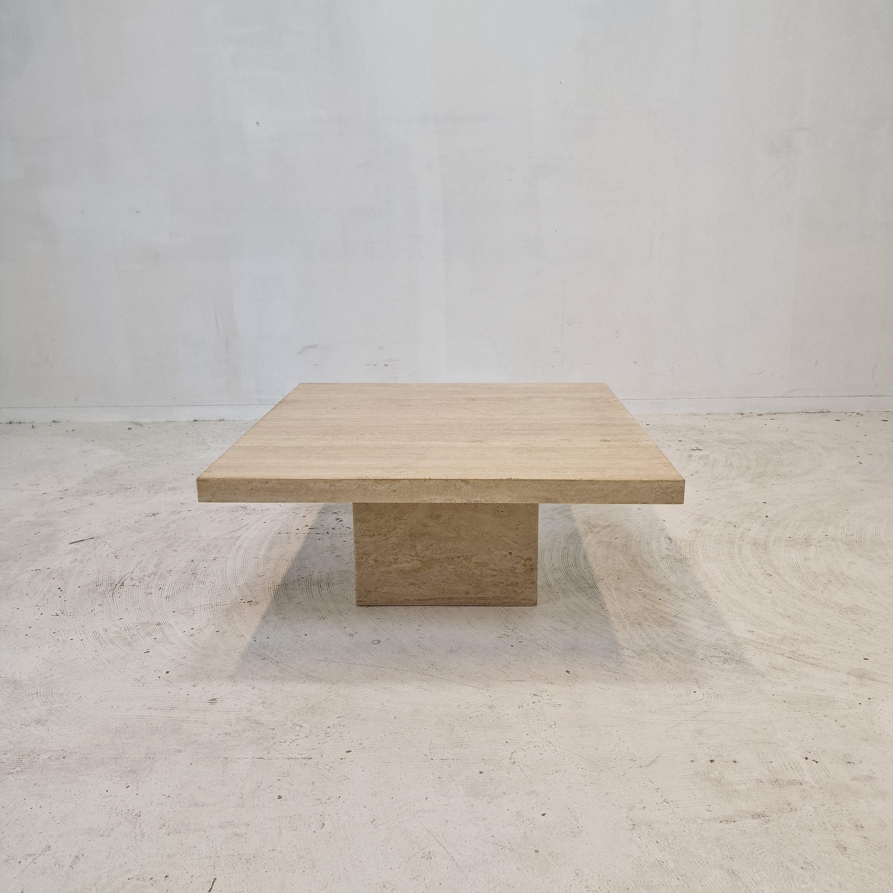 Very nice square shaped Italian coffee or side table handcrafted out of travertine, 1980s. 

It is made of beautiful travertine. 
Please take notice of the very nice patterns. 

It has the normal traces of use, see the pictures. 

We work with