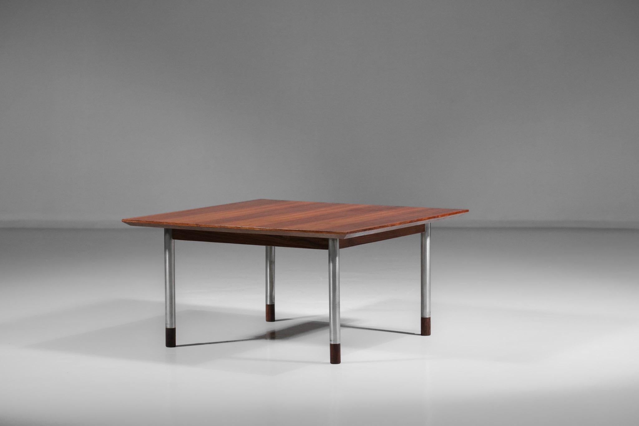Italian coffee table from the 60s in the style of designer Finn Julh. Square top in rosewood with bevelled edges, beautiful wood grain on the top. Chromed steel base with a reminder of rosewood on the end of each leg. Very nice vintage condition (cf