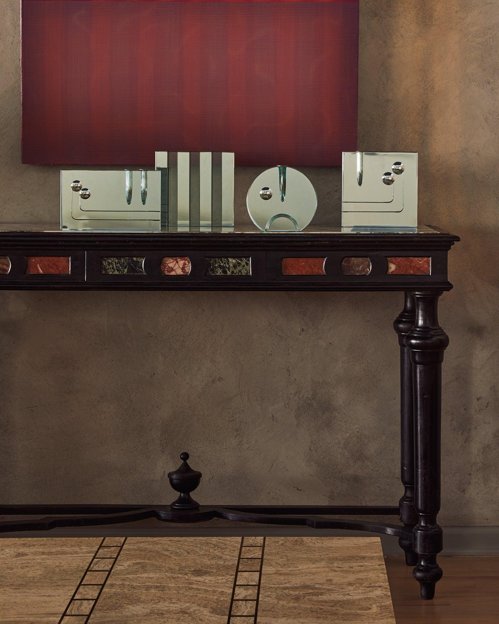 A sculptural Italian cut crystal vase designed by Pierangelo Gallotti 
Luigi Radice in the 1960s. Produced by Fontana Arte, one of Italy’s most esteemed glass manufacturers, its pure geometric form is disrupted by an ingenious curvilinear