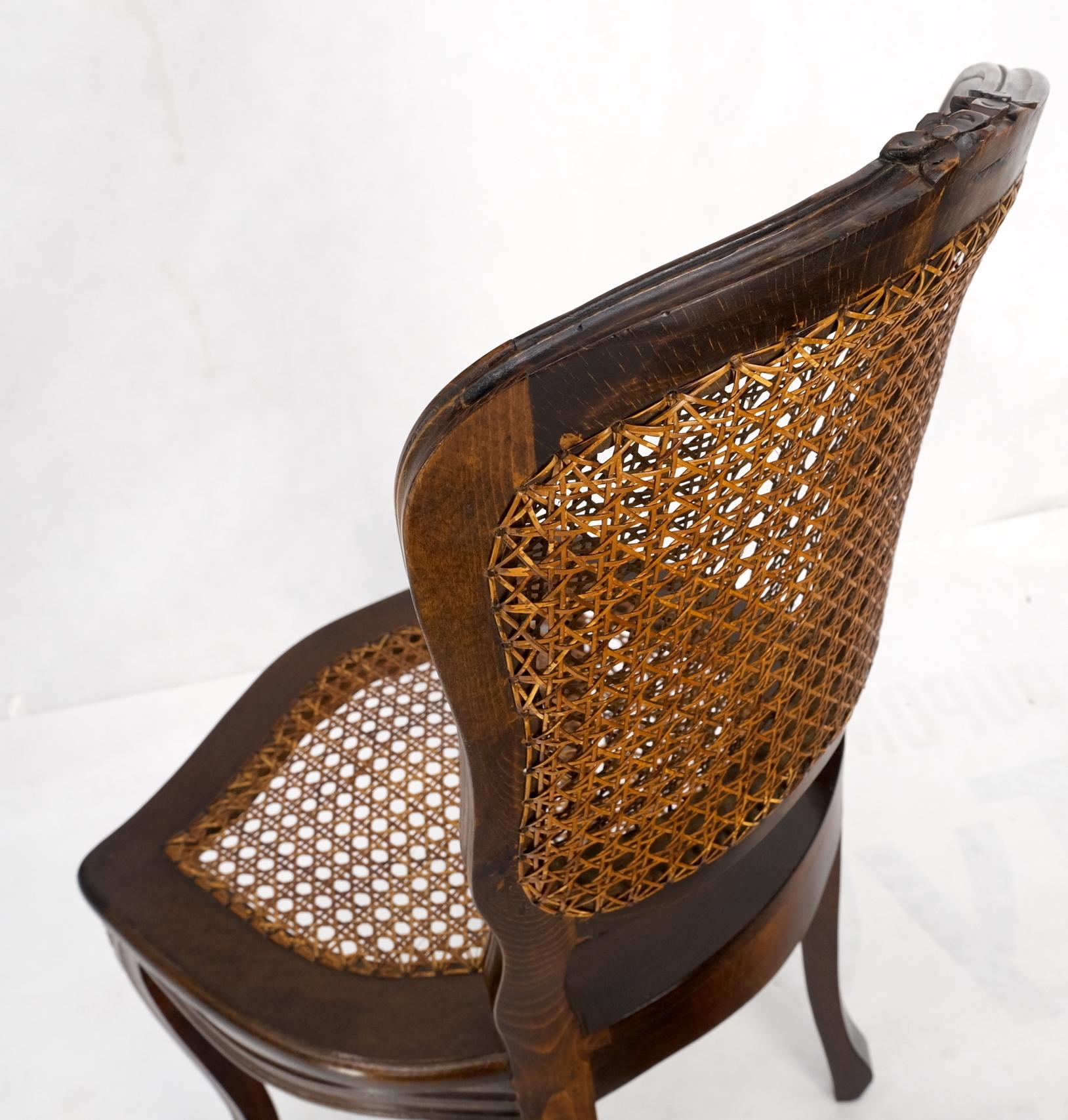 Italian Square game dining table w/ two matching cane seat & double back chairs. Double cane back chairs. Table 36x36x29