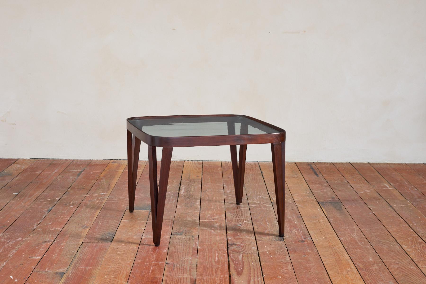 Italian Square Glass table with tapered hairpin legs constructed of mahogany wood with original glass. 

Unique shape and scale - can be used as coffee or side table 
