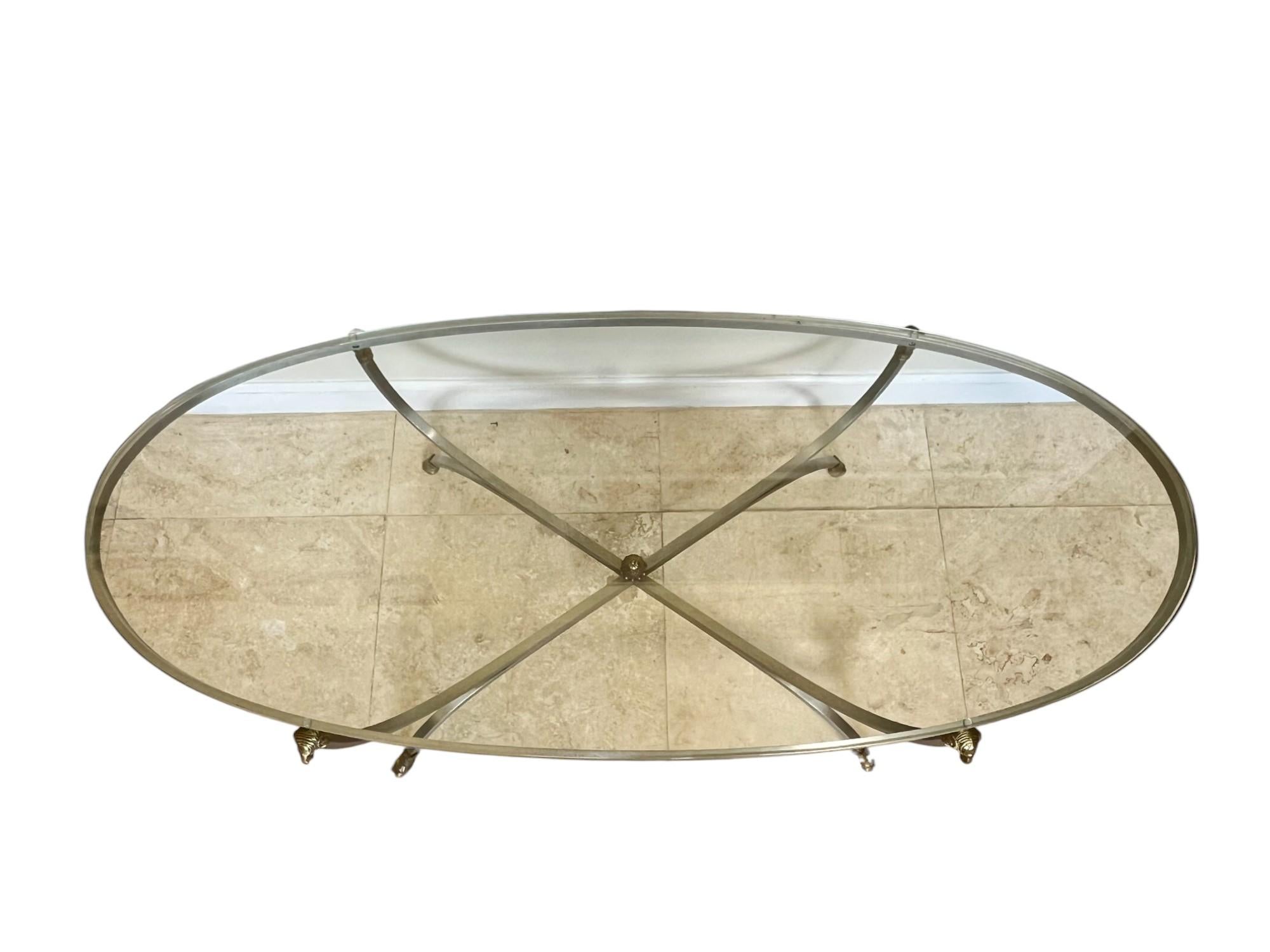 20ième siècle Table basse ovale italienne à tête de bélier en acier et laiton, années 1960 en vente