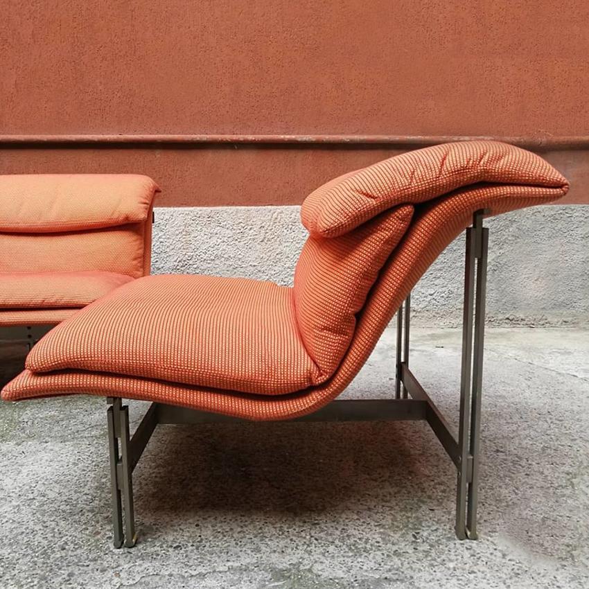 Italian steel and fabric wave sofa and armchair, by Giovanni Offredi, 1974. Beautiful Wafe set, composed of a two seats sofa and an armchair, with a stainless steel structure and an orange fabric padding, which is still the original one. Very good