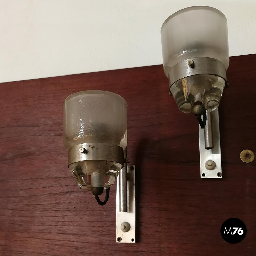 Italian steel and glass sconces by Marco Zanuso for Oluce, 1950s
Unfindable pair of Italian sconces by Marco Zanuso for Oluce, dating to the 1950s.
Structure in frosted steel with a small arch rod that supports a thick opaque glass cup, provided