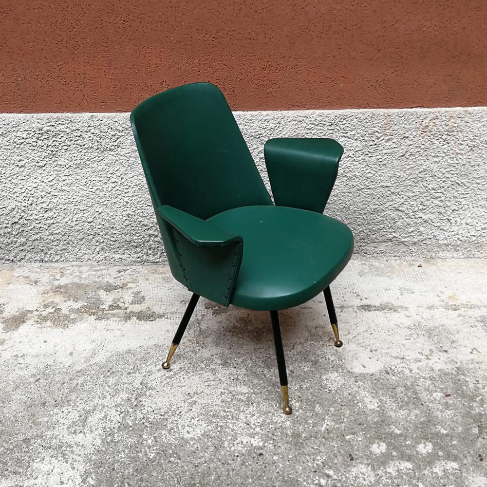 Italian steel, brass and green faux leather armchair, 1950s
Armchair with armrests entirely covered in sky teal / green, metal legs and brass tips
Good general conditions.