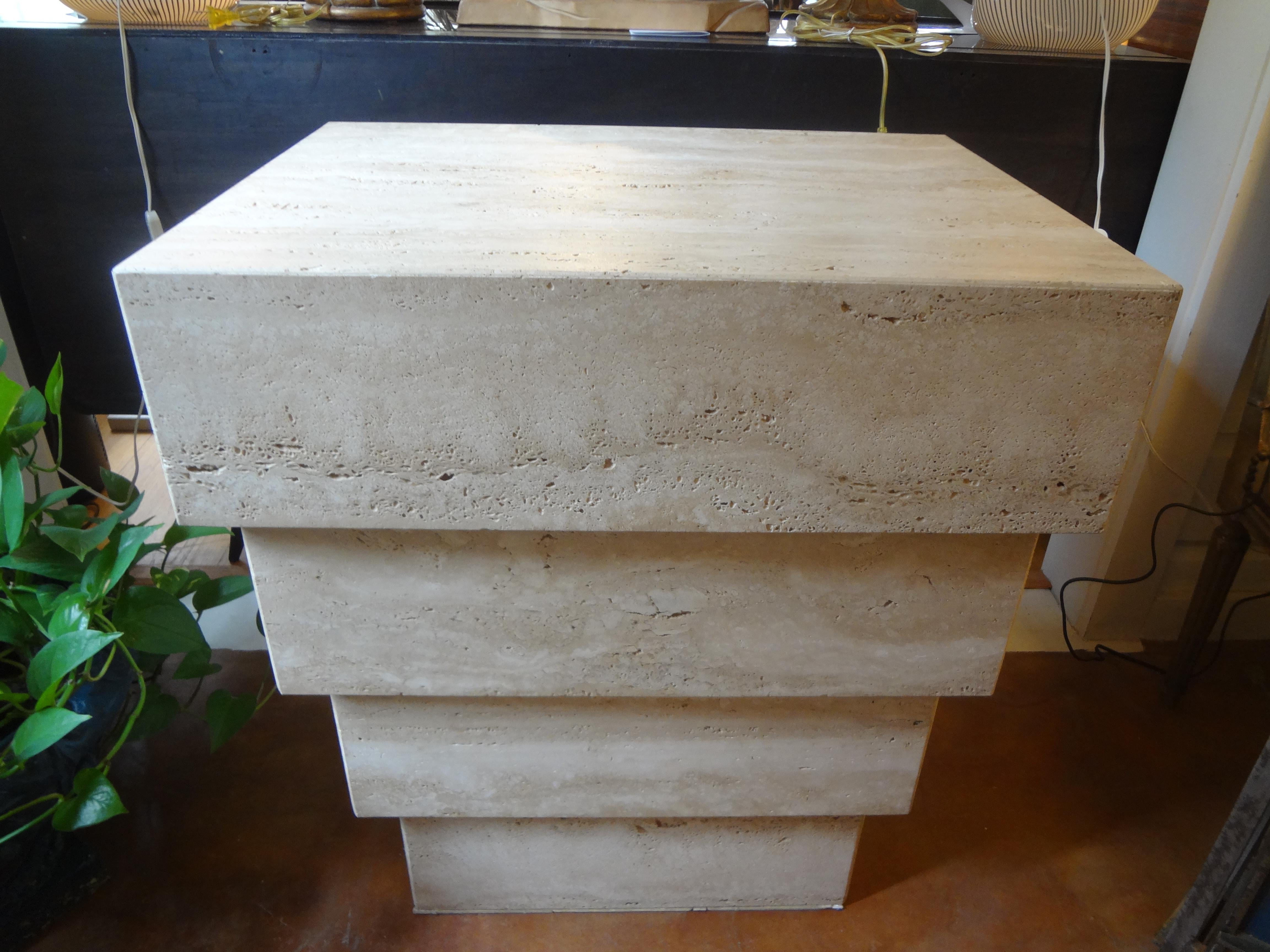 Beautiful Italian Angelo Mangiarotti style travertine pedestal, console or dining table base consisting of an inverted stack of honed travertine 